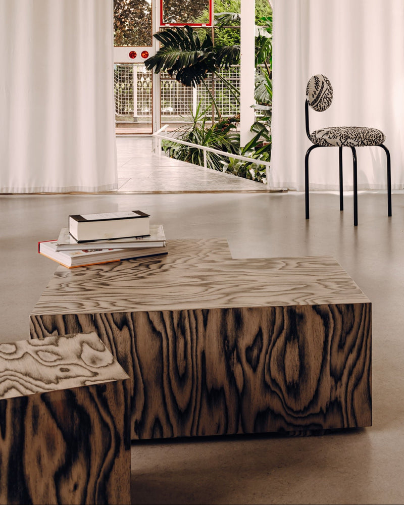 Coffee Table Object108 in ALPI veneer by Sottsass — close-up of wood grain texture in modern setting