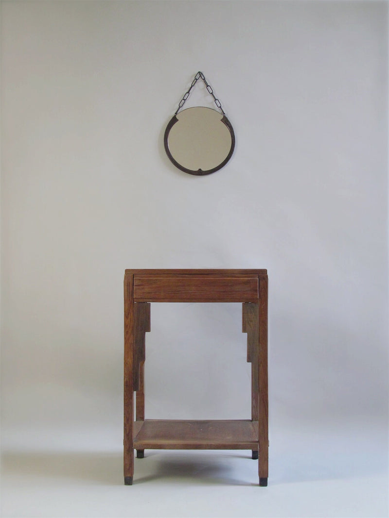Amsterdam School Side Table c.1920 — front view of wooden table against plain backdrop