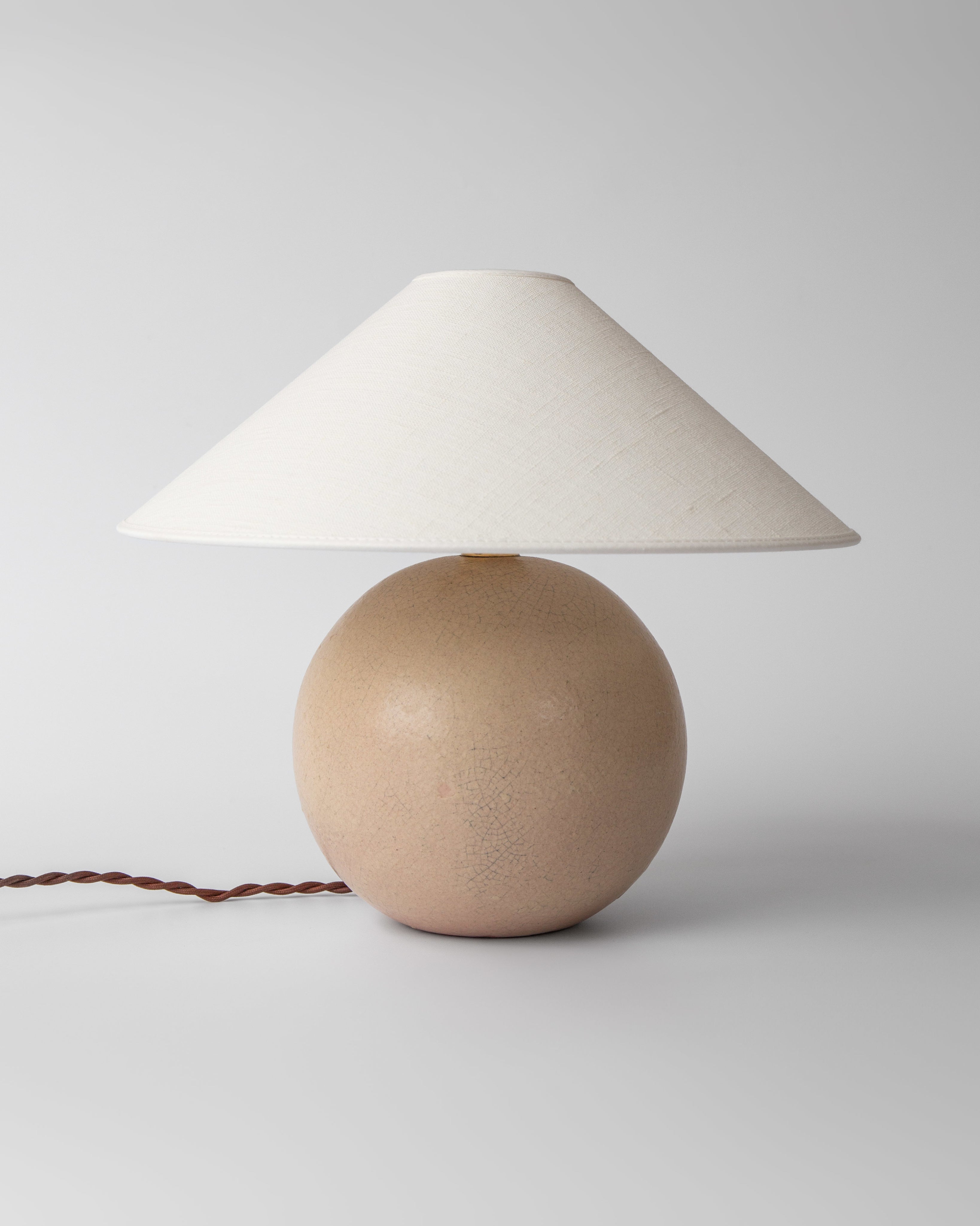 Spherical Modernist Ceramic Table Lamp, 1940s, Sweden — side angle showing beige ceramic base and fabric shade