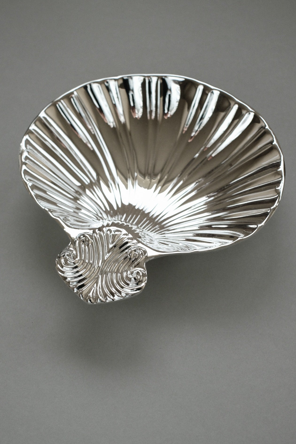 Silver-Plated Shell Tray — angled view on gray background