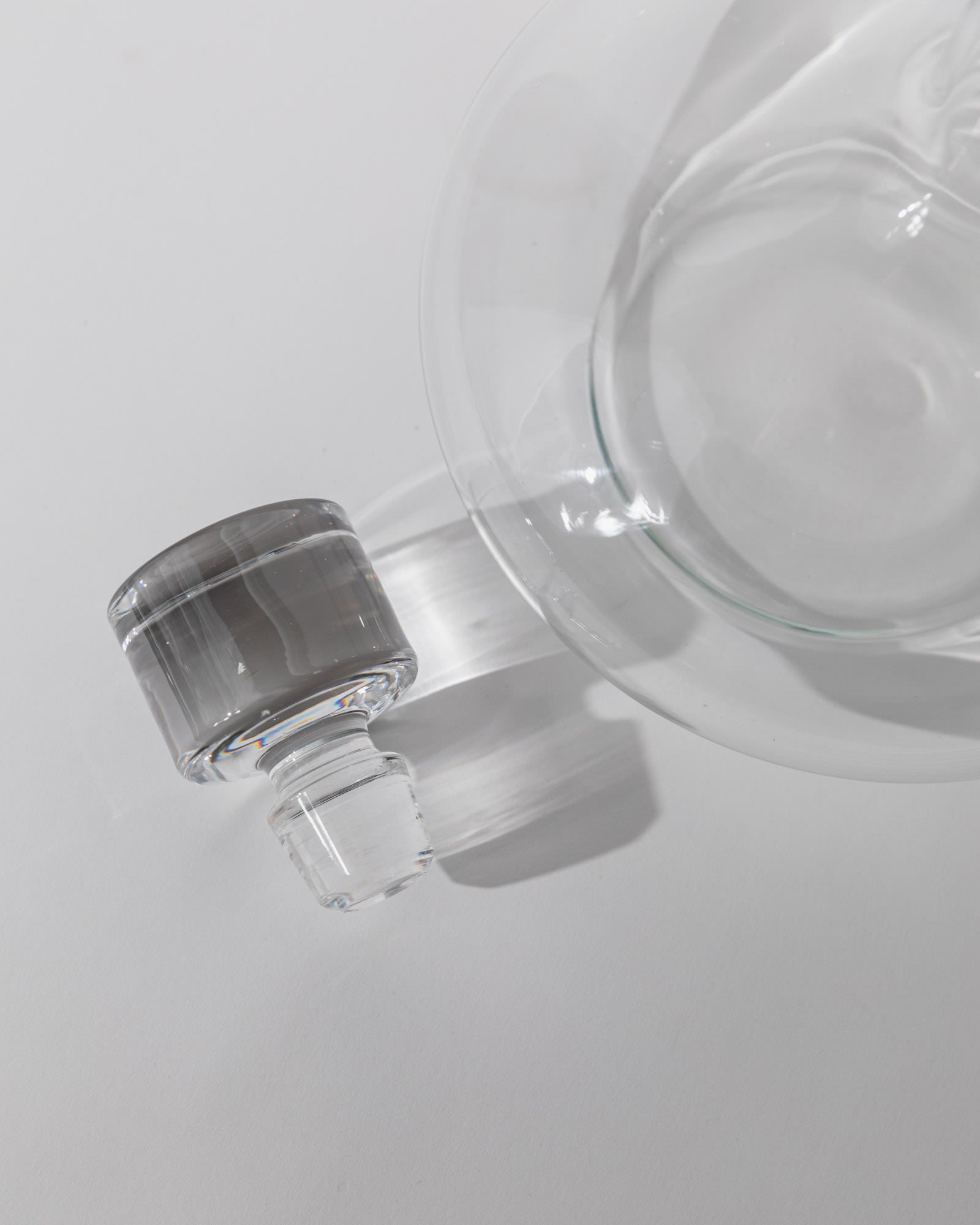 Vintage 1980s Glass Decanter, Italian Glass Ware with Glass Stopper — side angle showing clear glass and stopper