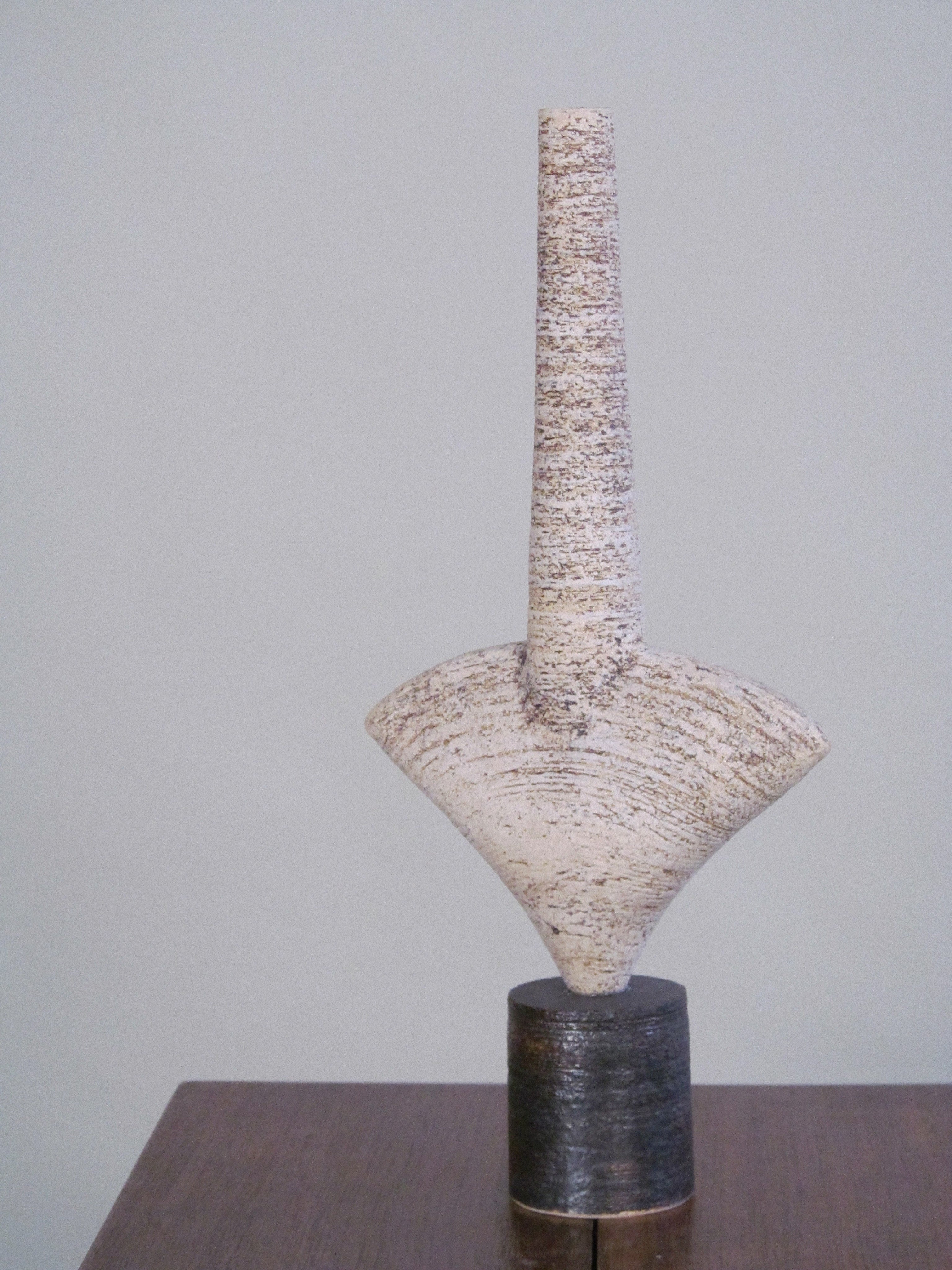 Pair of Dameon Lynn Ceramic Forms — front view on wooden table