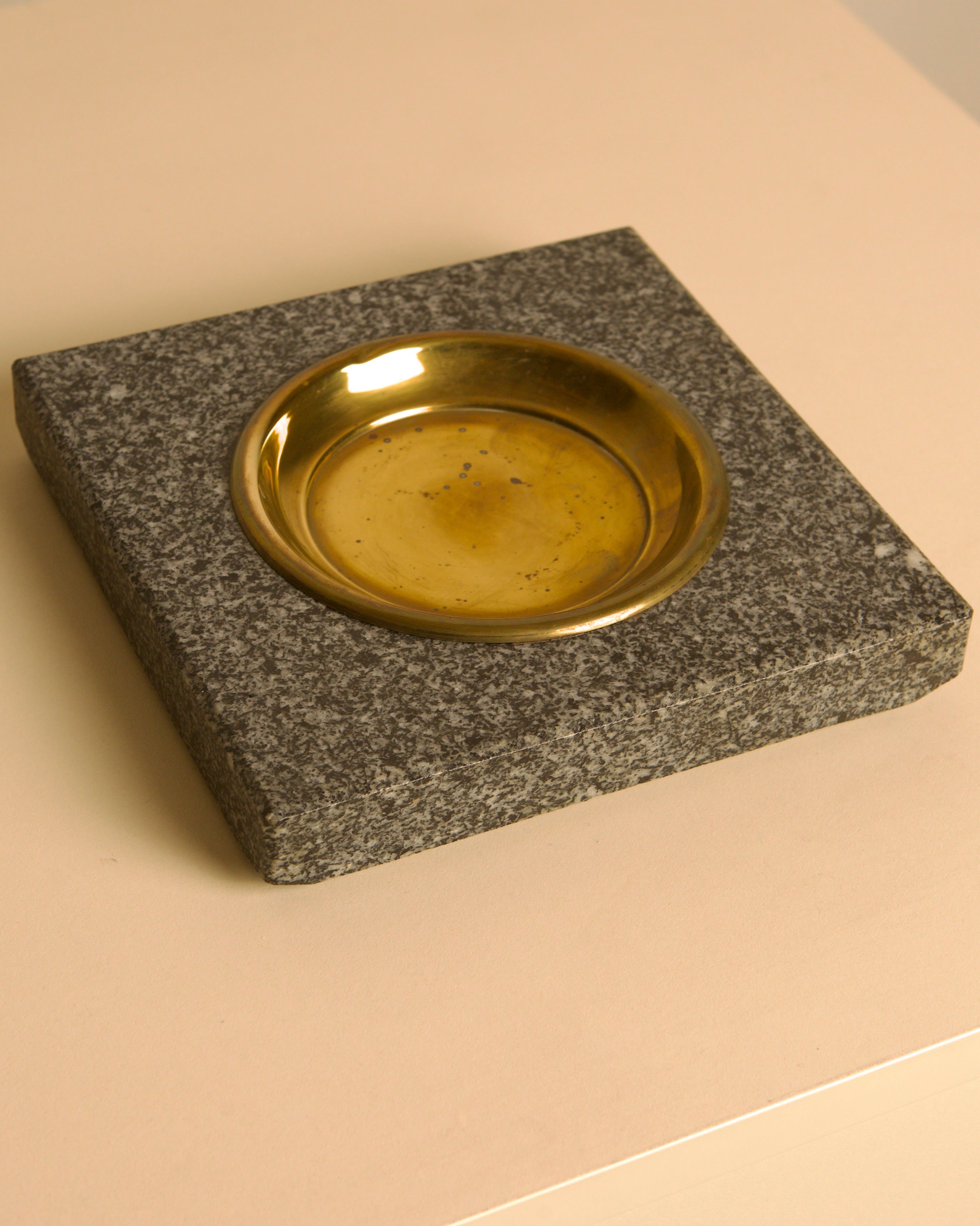 Italian granite and brass vide-poche, 1960s  — lifestyle setting