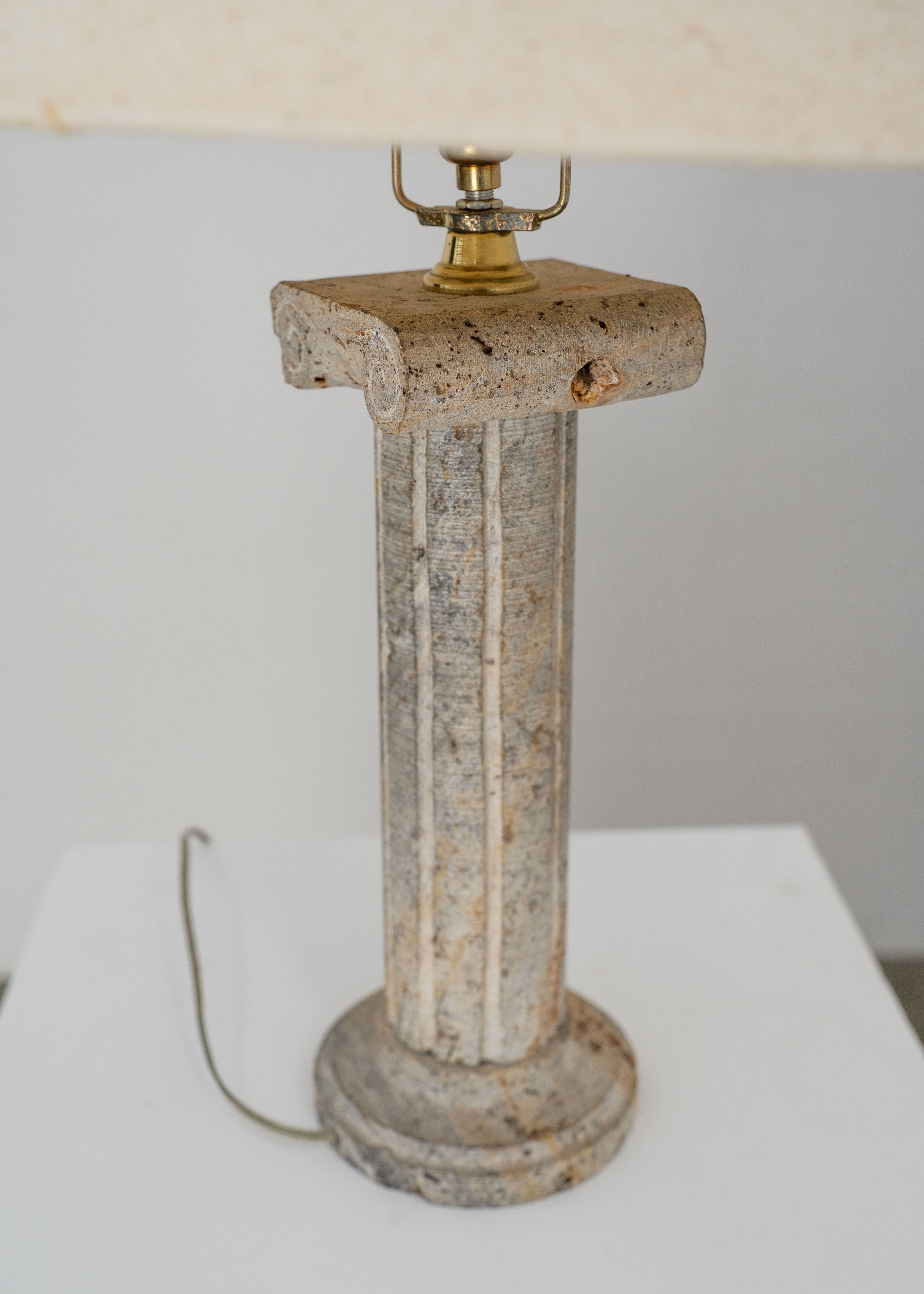 Postmodern Stone Column Table Lamp — top view of stone base and brass socket