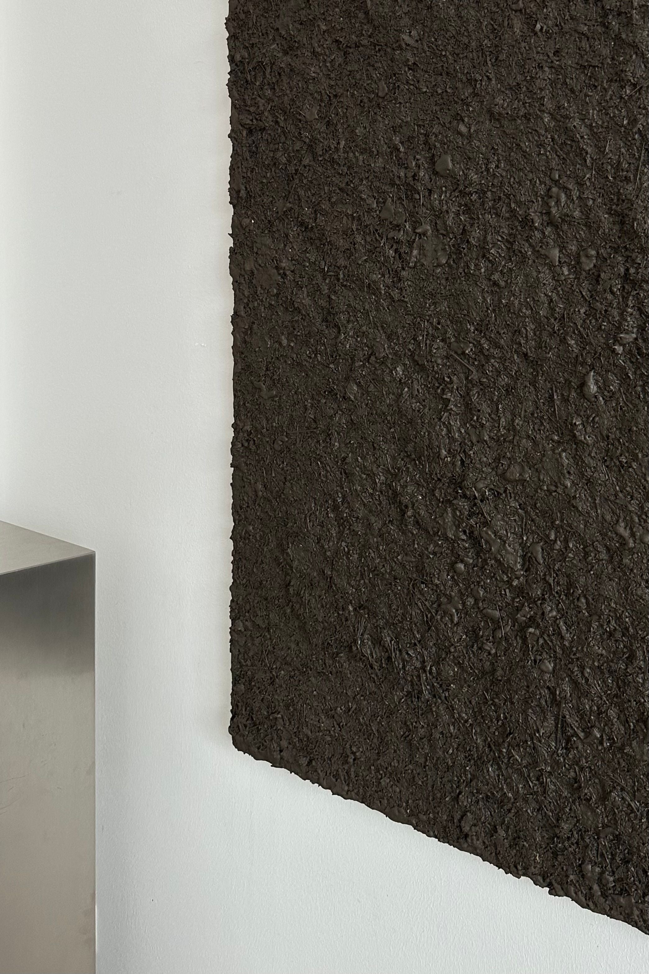 ARCHE 07' sculptural wall art — close-up of textured dark surface