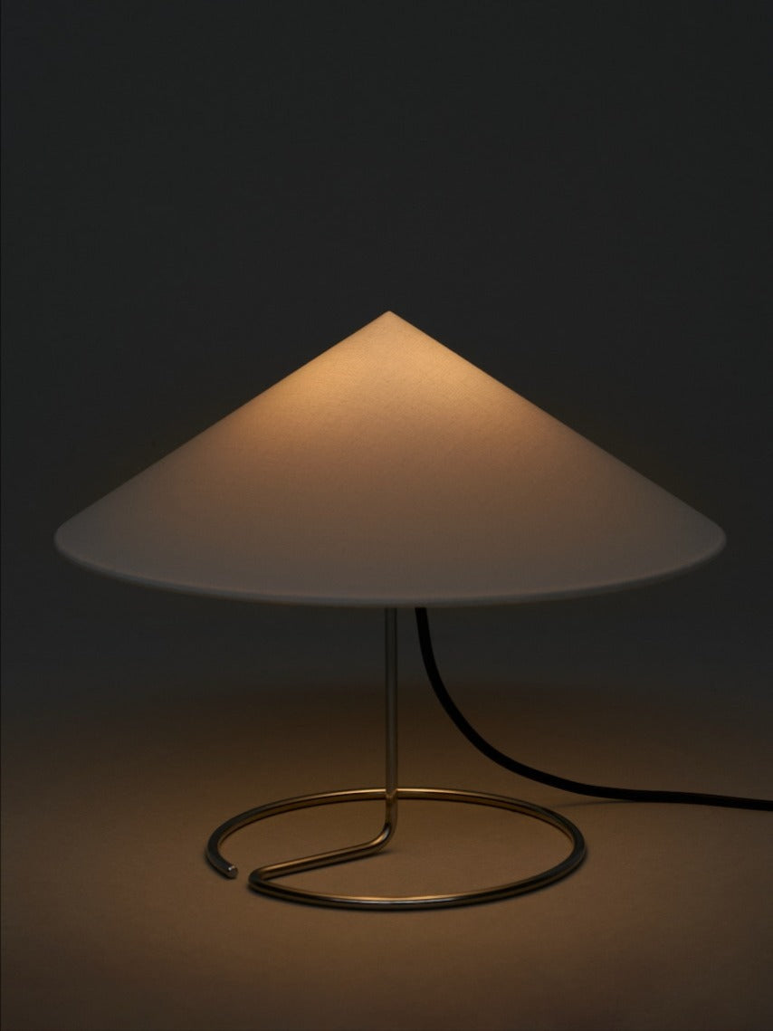 Douli Table Lamp — angled view with white shade and metal base