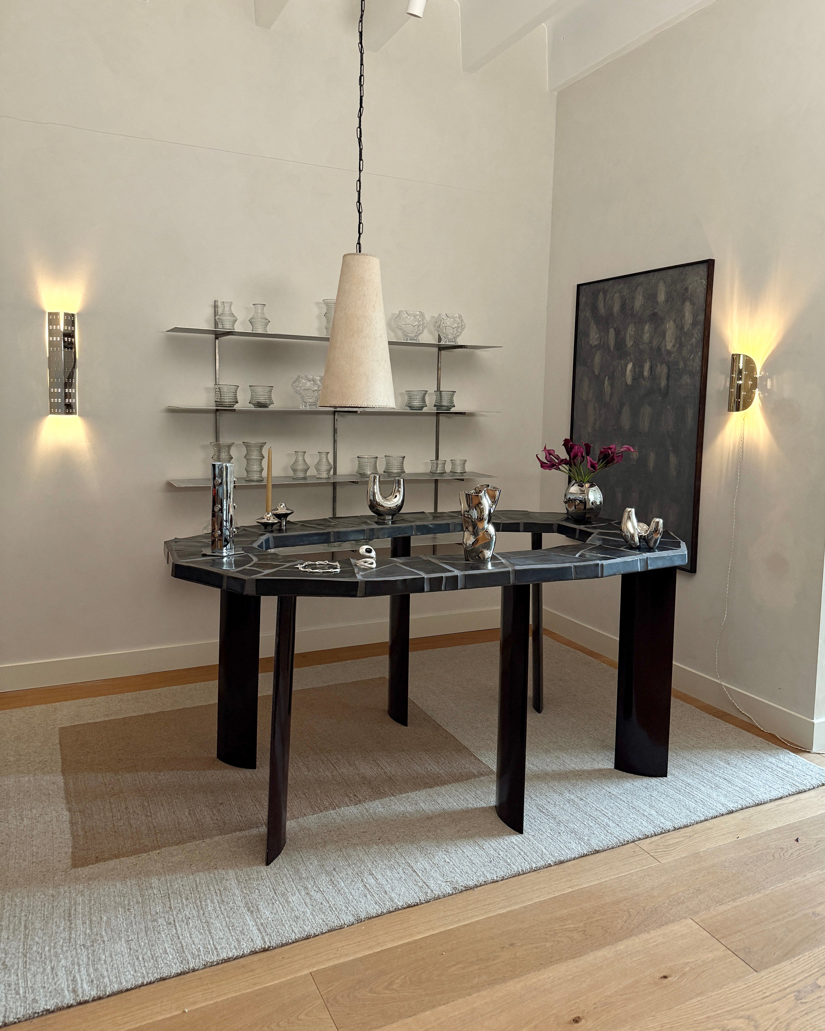 May Wall Lamp - Polished Brass — side view in modern dining area