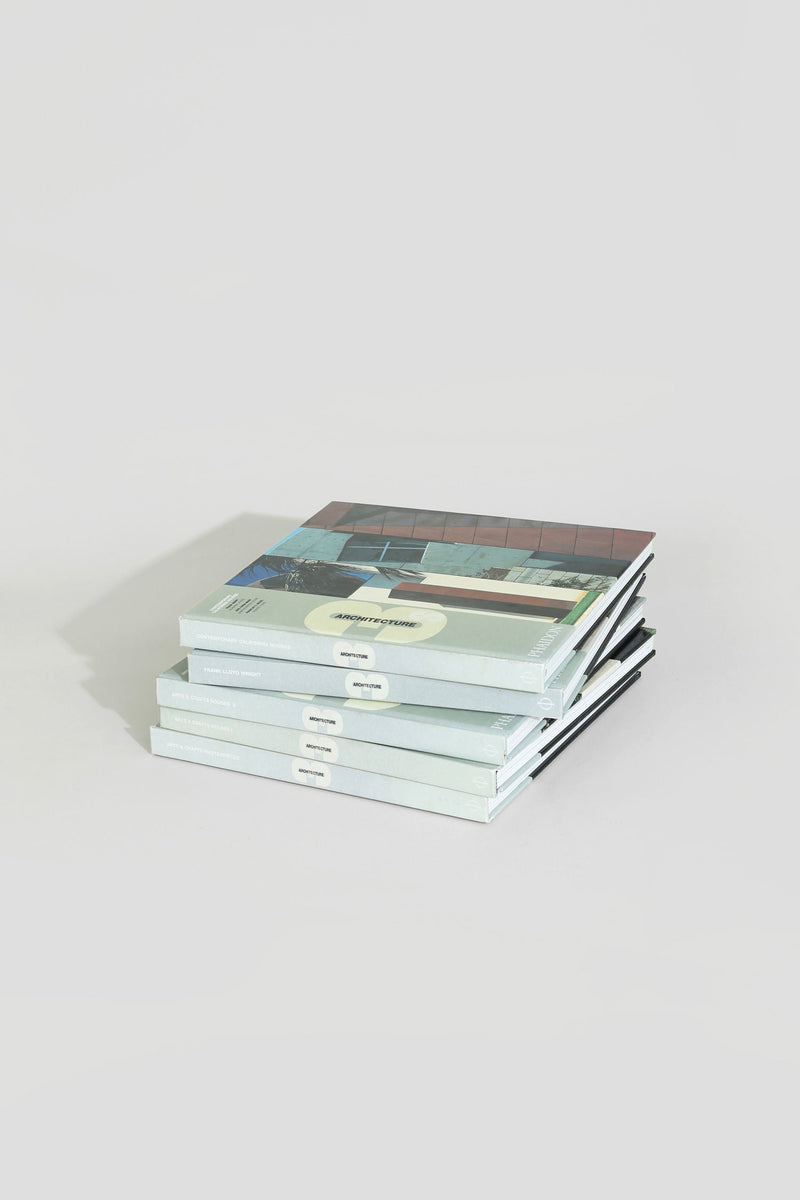 The Villa Architecture Book Series - Set of 5 features modern, minimalist covers and is neatly arranged on a light gray surface, ideal as a stylish architecture coffee table book display against a white background.