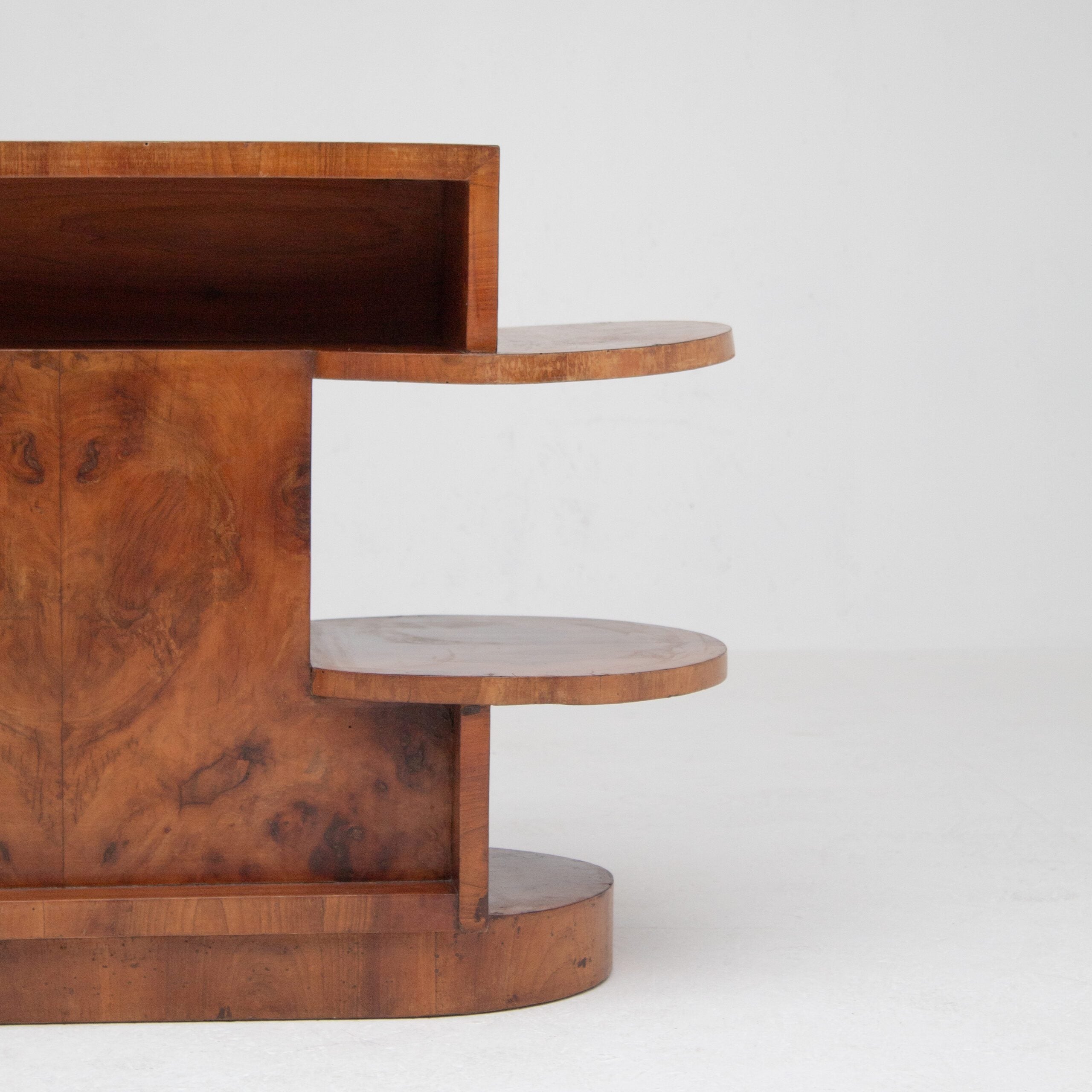Art Deco Etagere Shelf Unit — side view of wooden shelves in neutral setting