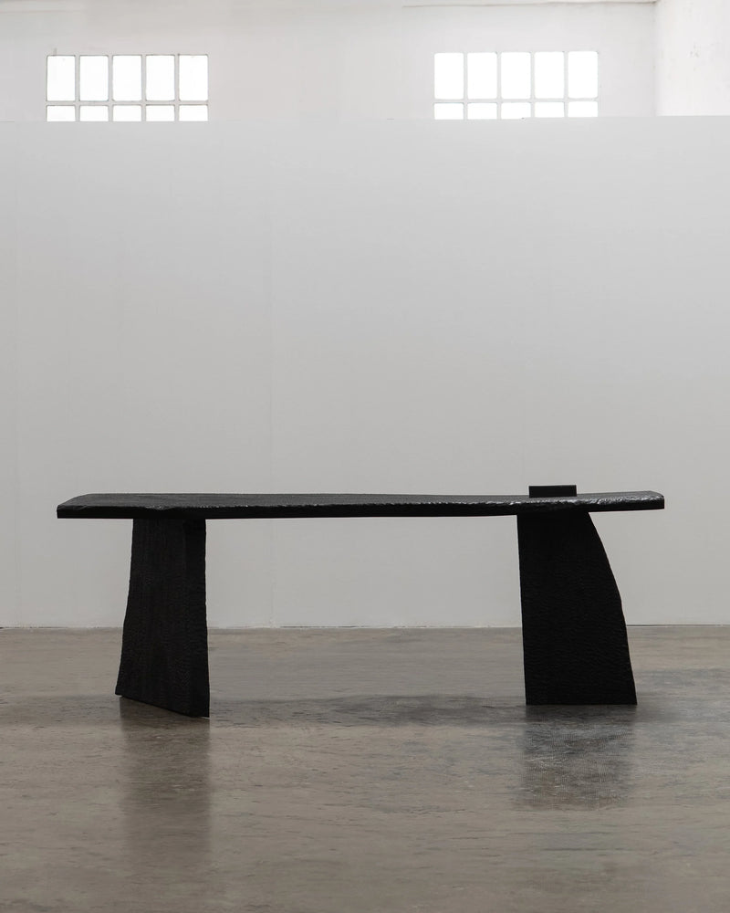 Massif Dining Table from Charred Eucalyptus Wood — side angle