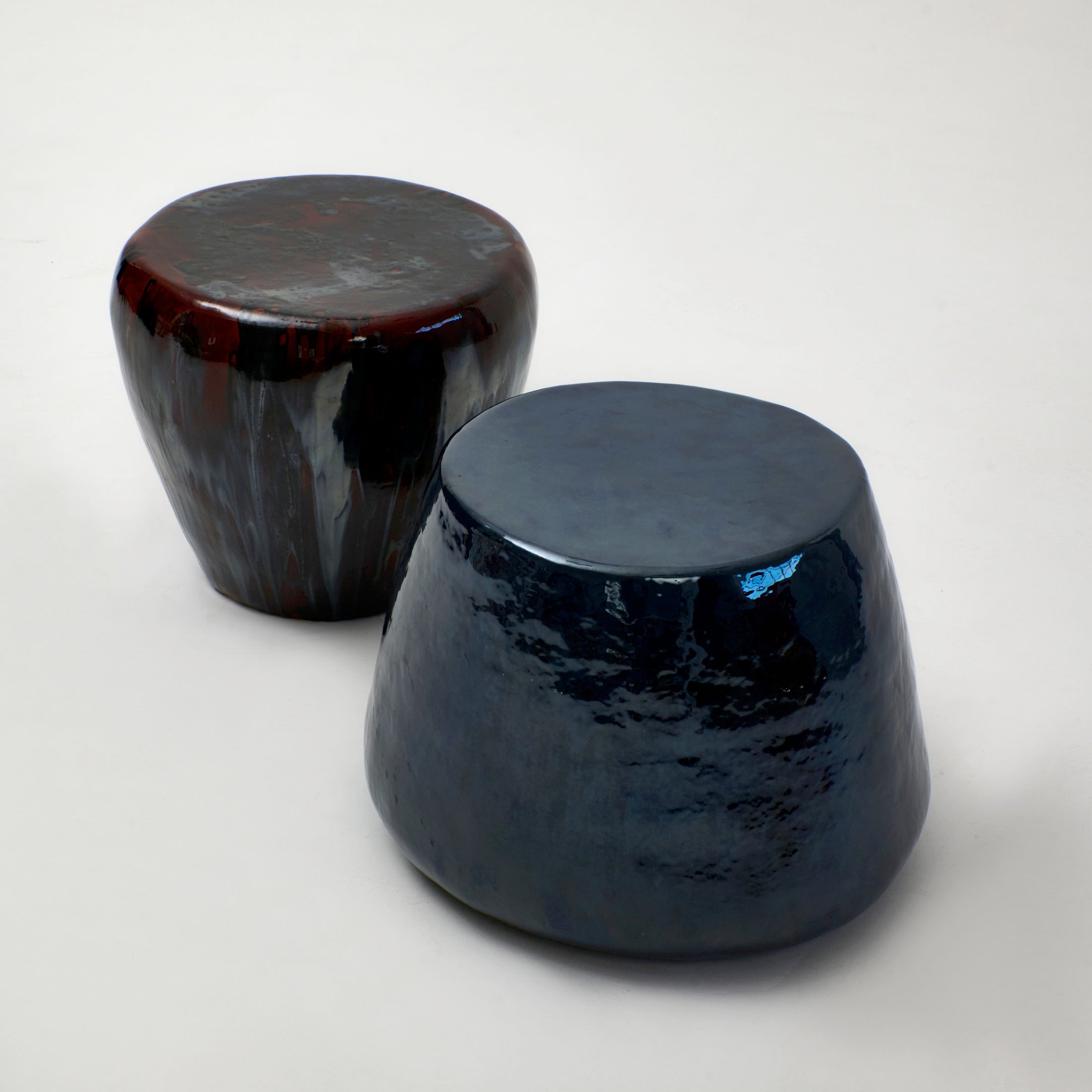 Medium Ceramic Side Table — angled view showing glossy dark finish