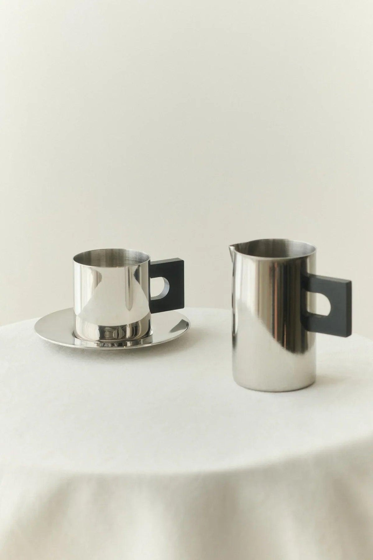 S.R. METAL CUP & SAUCER — lifestyle setting