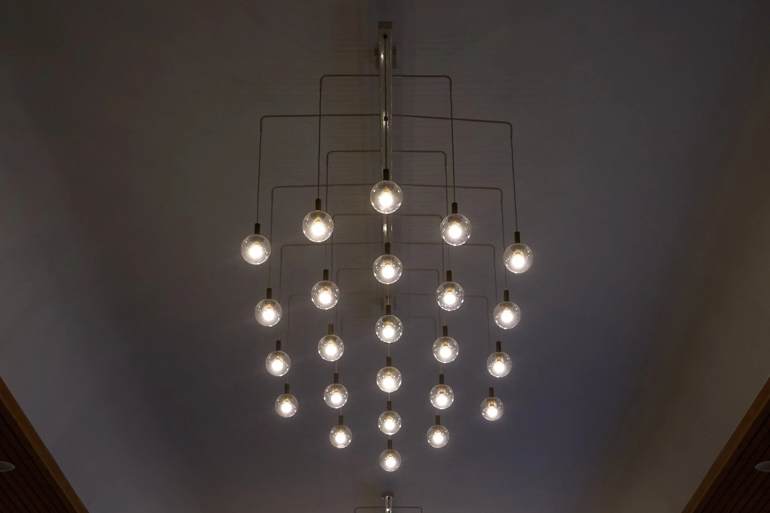 Monumental Pair of Mid-Century Chandeliers in Glass, Metal and Patinated Brass 1960, 1960 — lifestyle setting