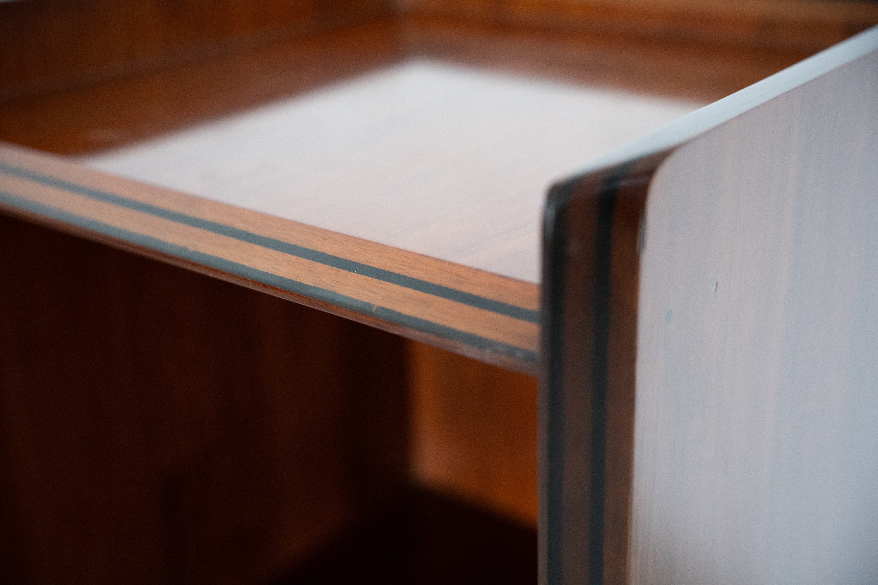 Artona Shelf by Afra & Tobia Scarpa for Maxalto — close-up of wooden shelf edge with inlay detail