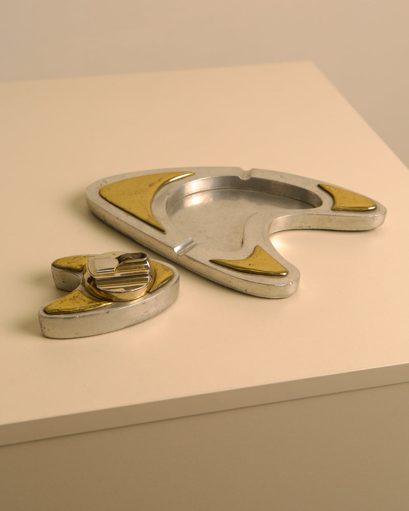 Mid-century silver and gold ashtray lighter set detail view