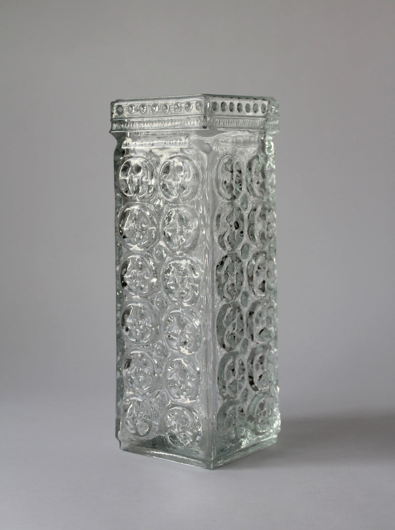 Clear glass rectangular vase with embossed circular pattern by A. Matura