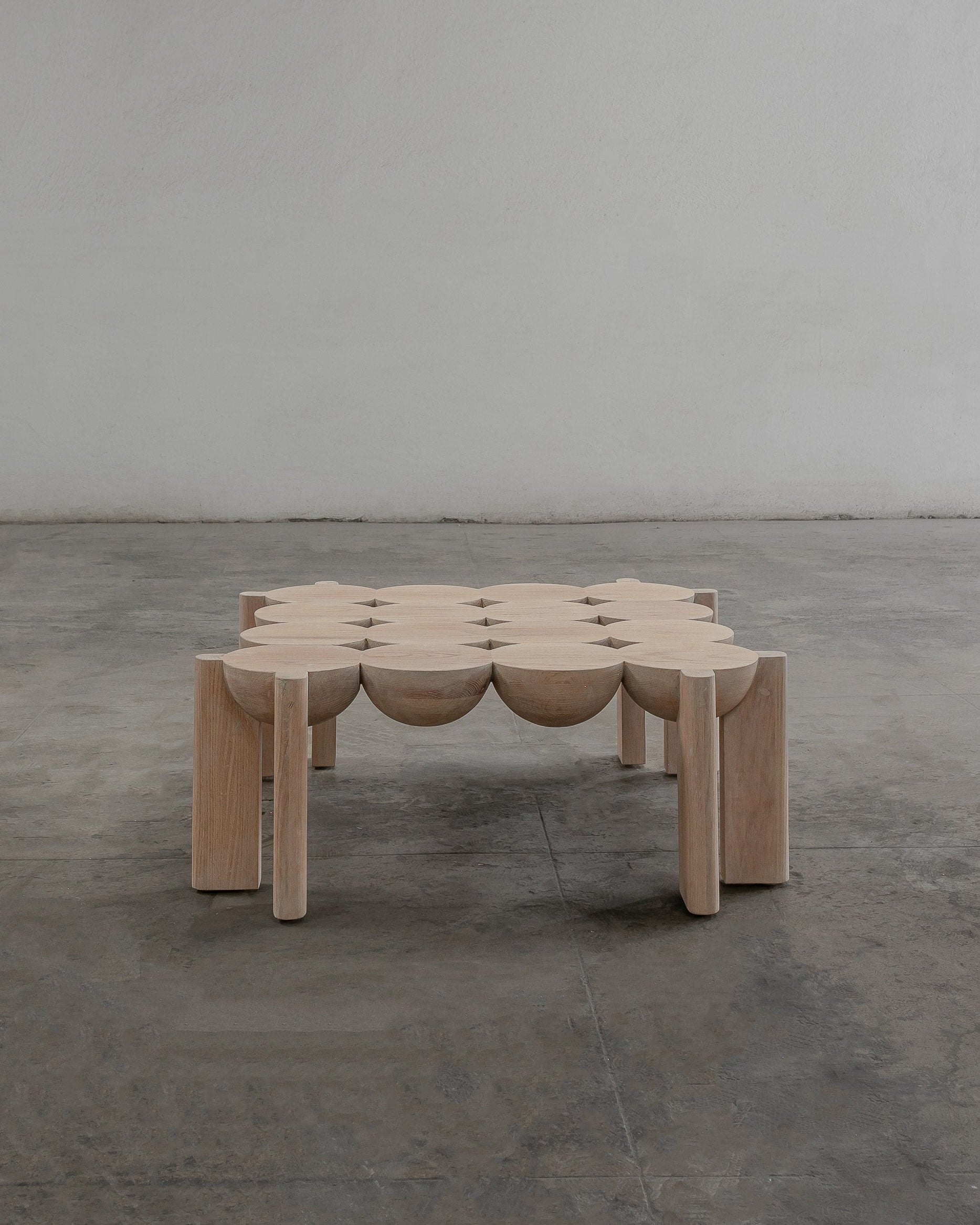BLEO Large Oak Coffee Table — front view on concrete floor