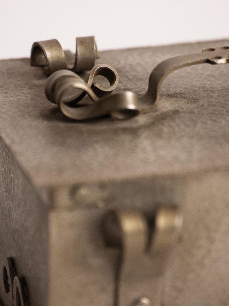 Arts and Crafts Hammered Metal Trunk Casket — Jugendstil Jewellery Box with Green Felt Interior — in context