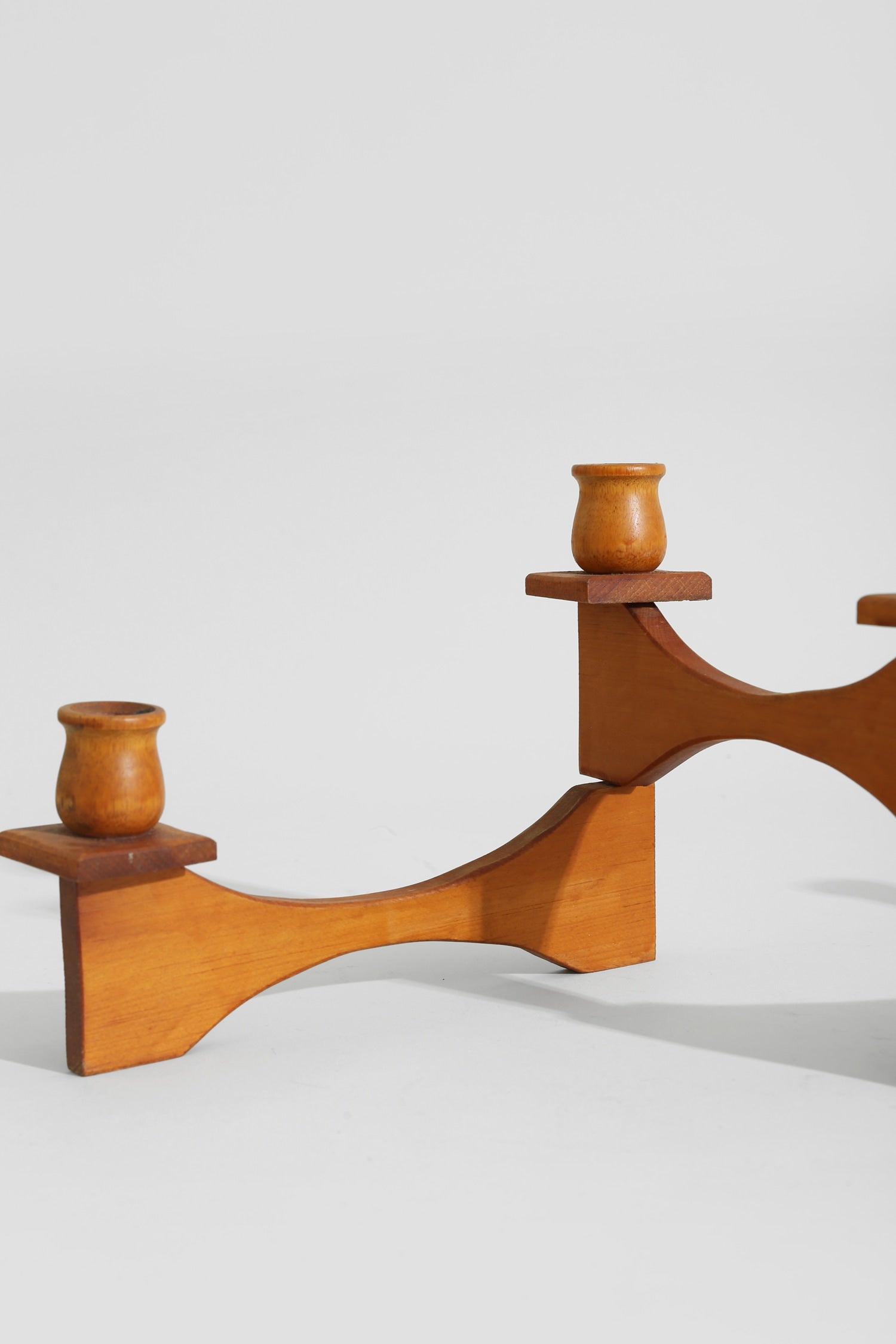 Expandable Wood Candelabra — side angle showing warm wood finish and candle holders