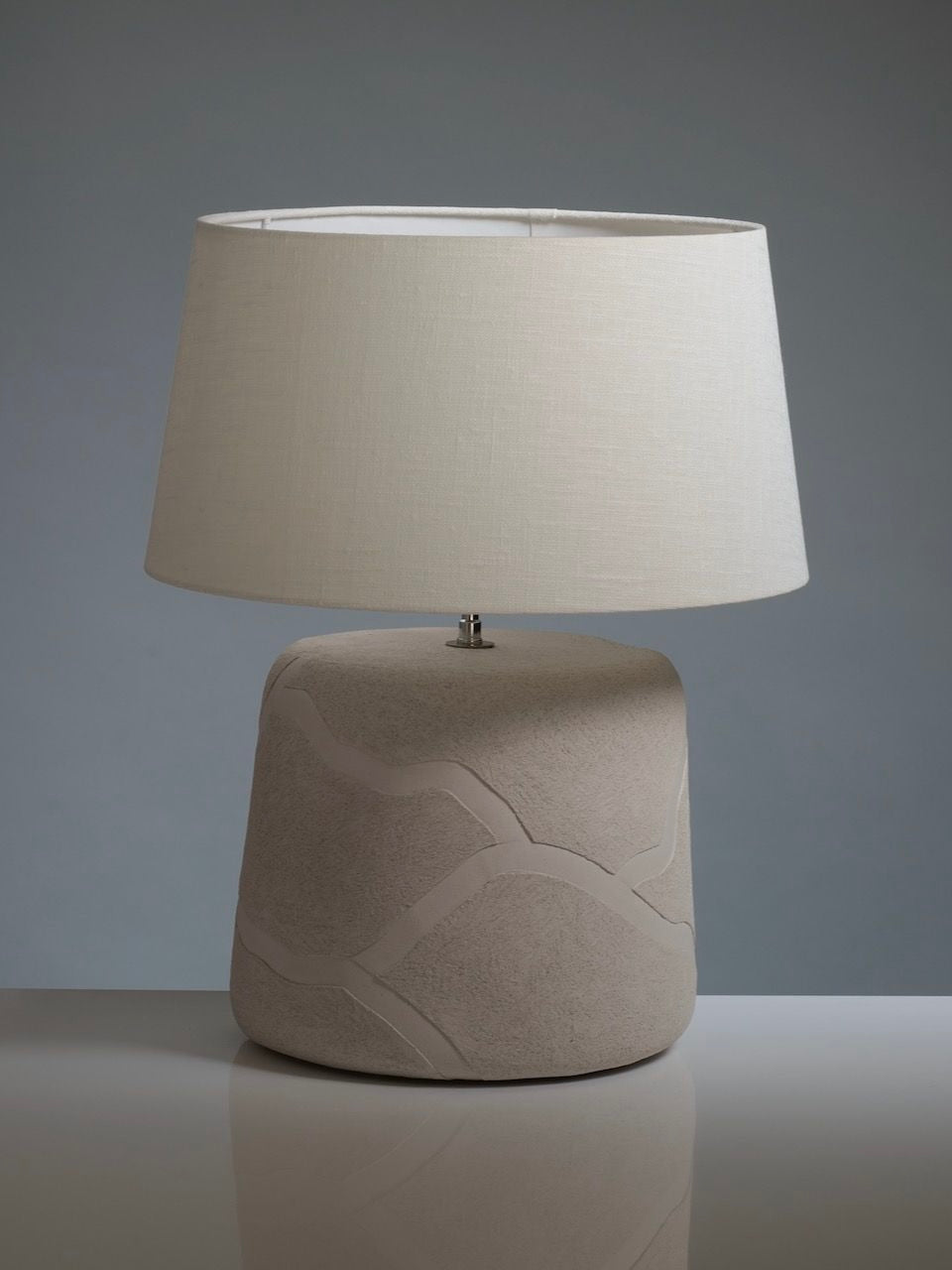 Africa Table Lamp in Ceramics — side angle showing textured ceramic base