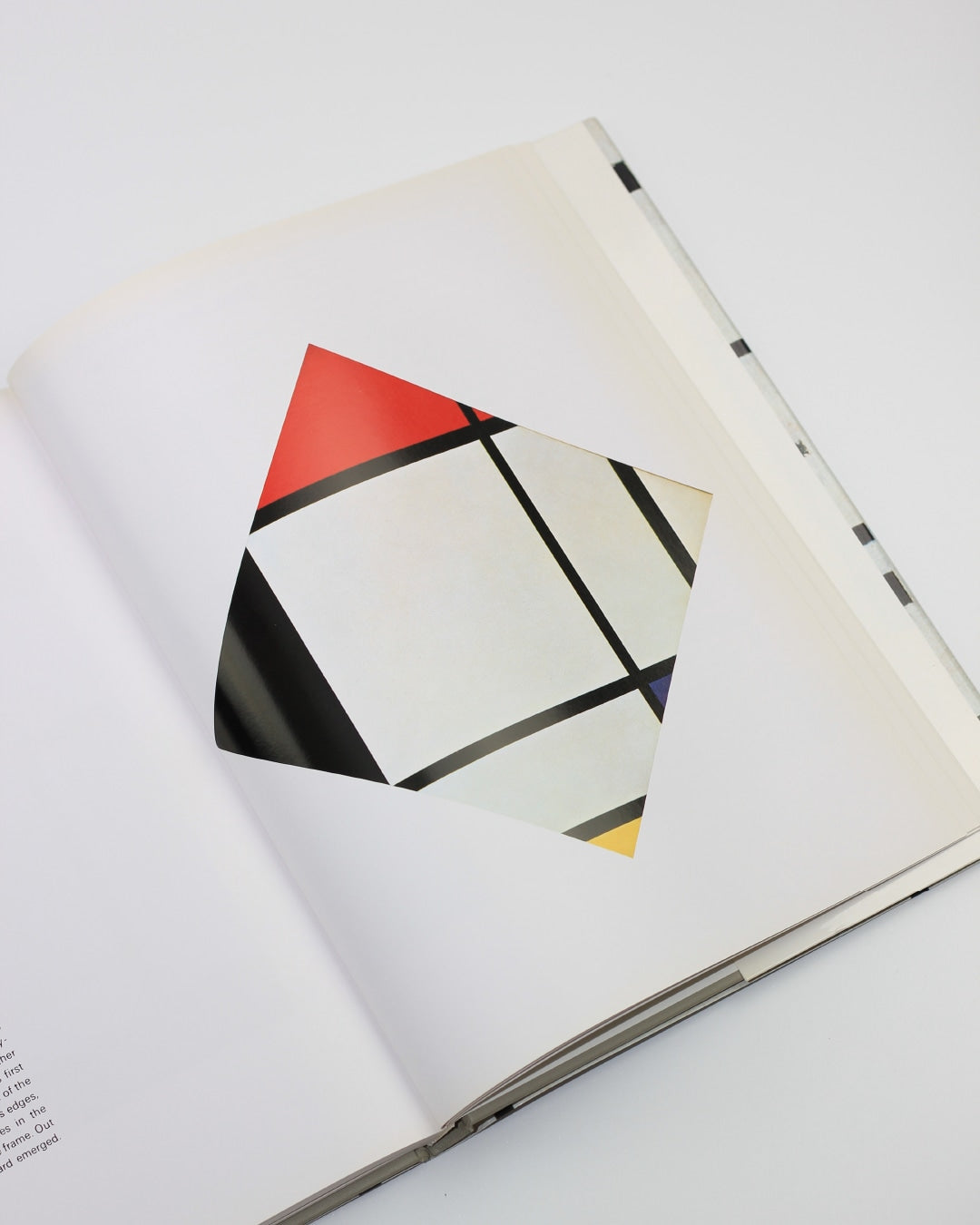 Mondrian — open art book with colorful abstract page