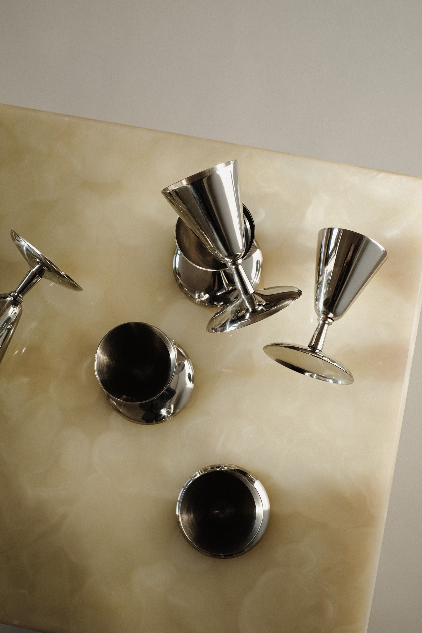 Set of 6 Coupes — overhead view on cream marble surface
