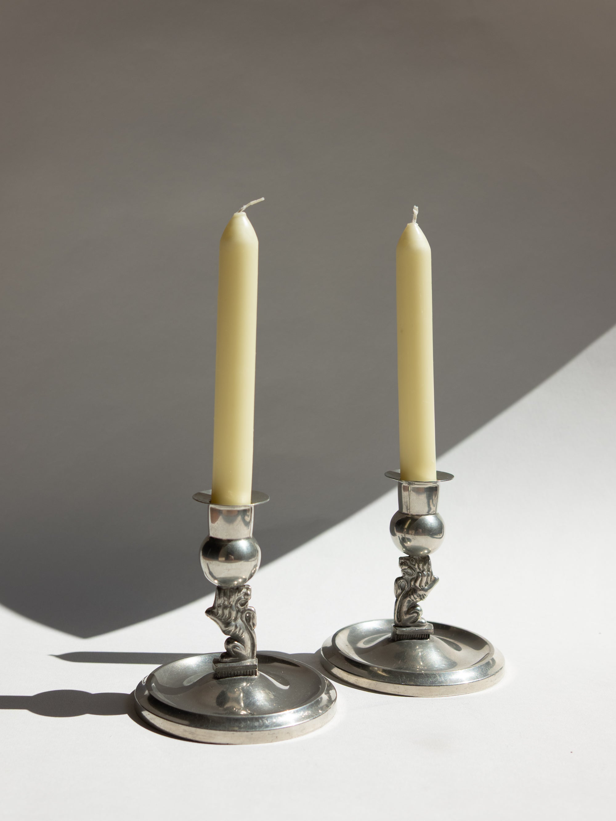 Pair of Swedish Grace Art Deco Pewter Lion Candlesticks by Eskilstuna Metallindustri, 1932 — detail view