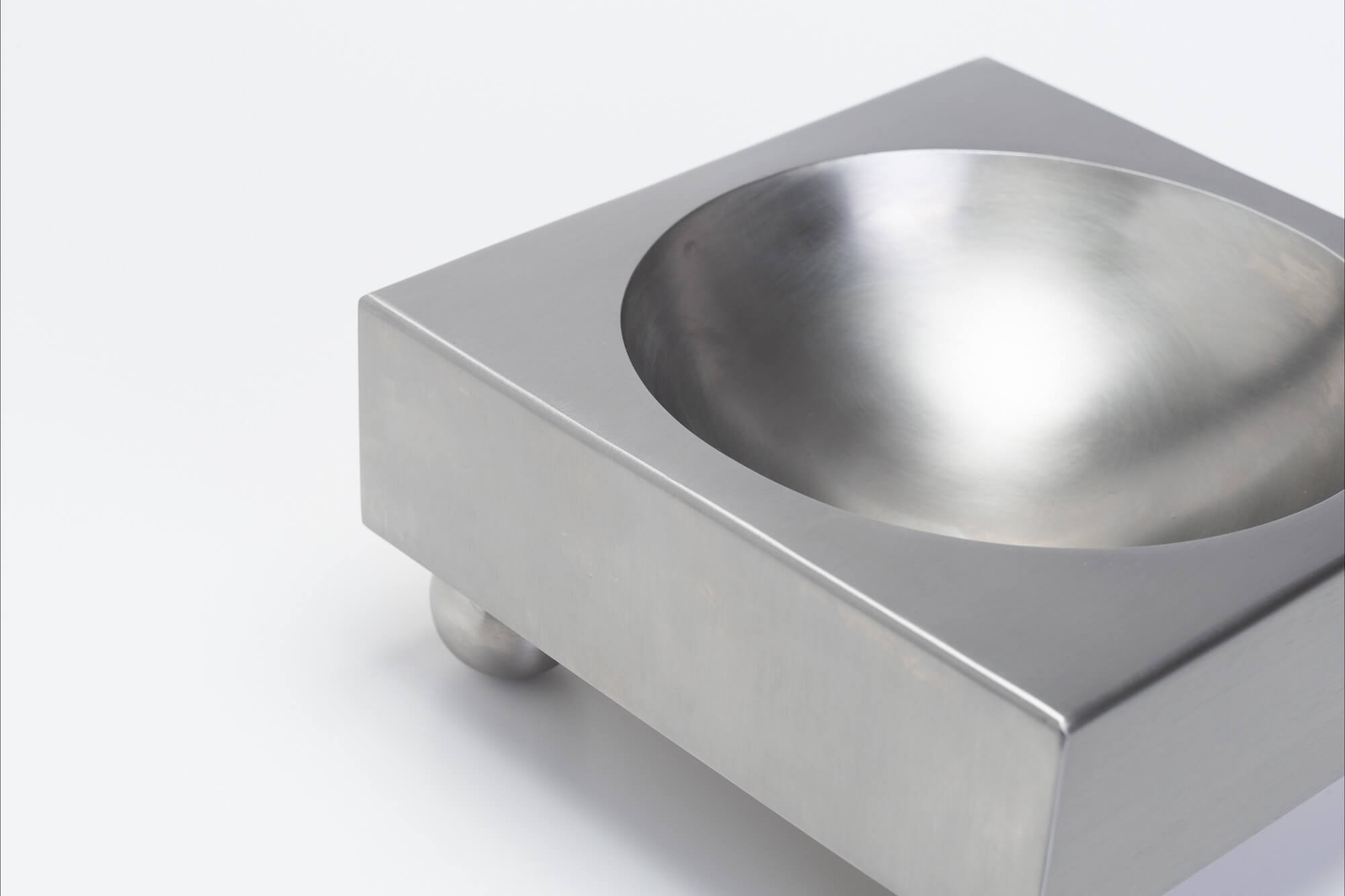 Brushed Stainless Steel Tray — angled view highlighting polished bowl surface