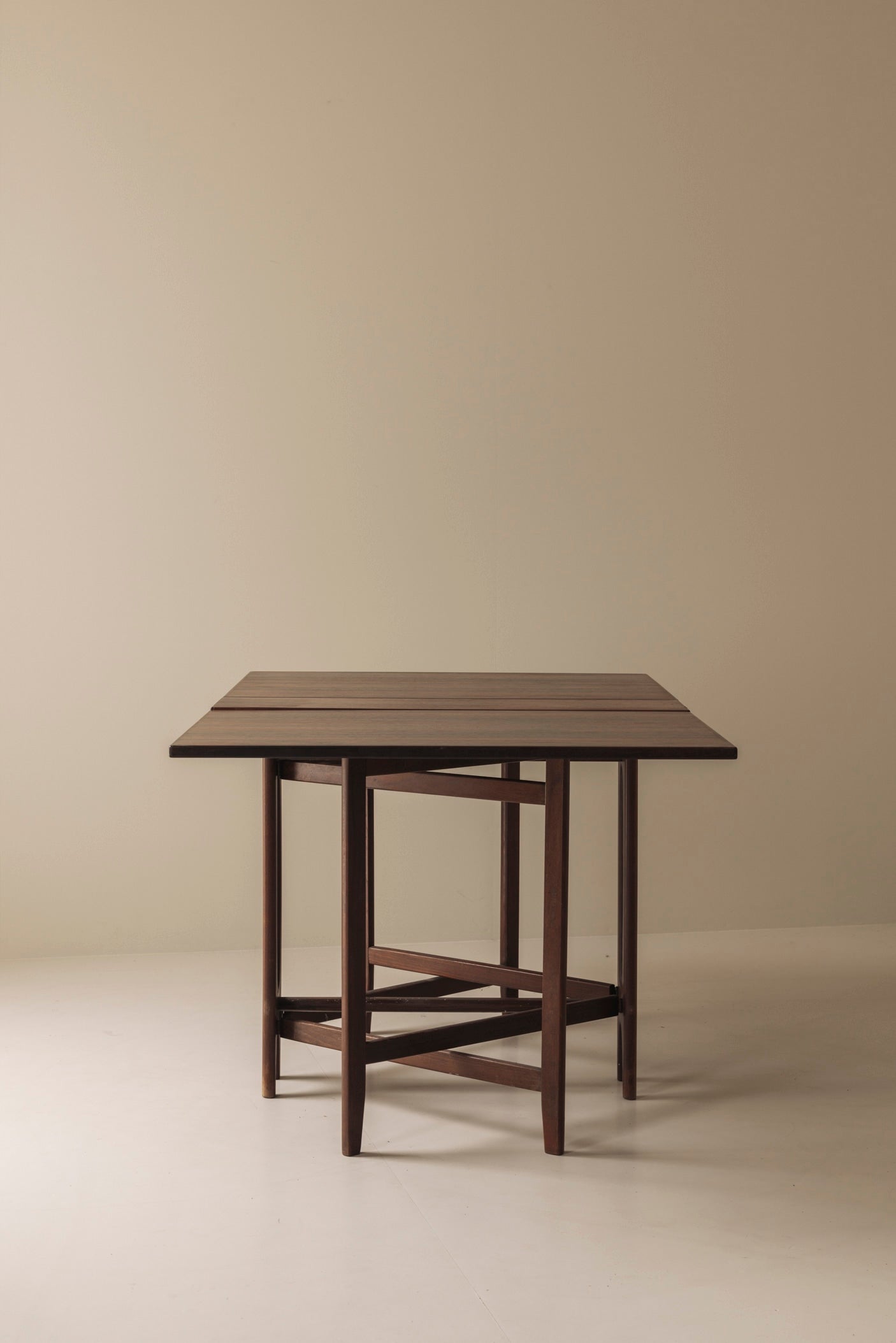 Rosewood folding table by Bendt Winge, Norway 1960s. — side angle