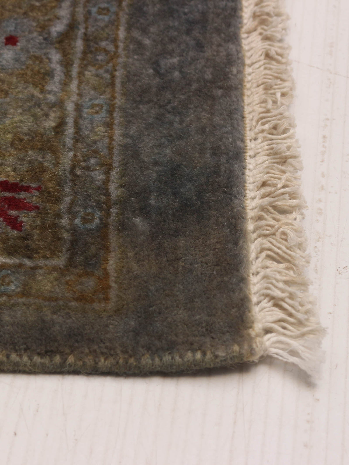 overdyed rug in tide 246 x 307 cm — side angle