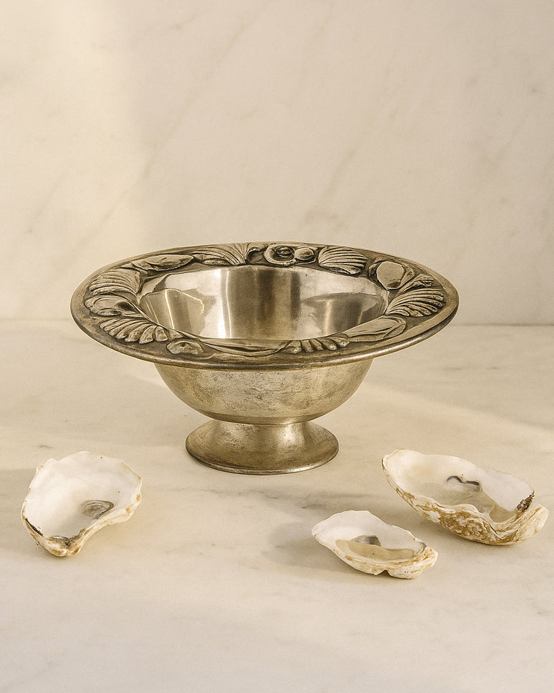 Vintage brass maritime oyster bowl with decorative rim and shells