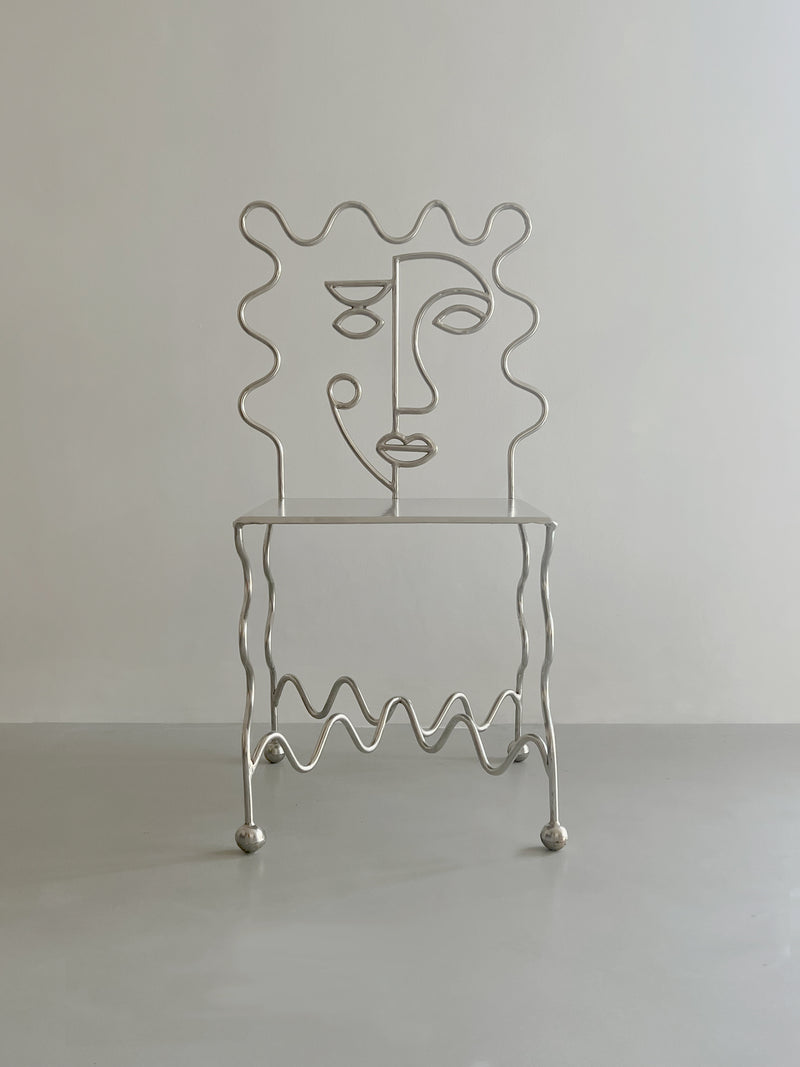 M. Dupont sculptural wire chair with artistic face backrest design