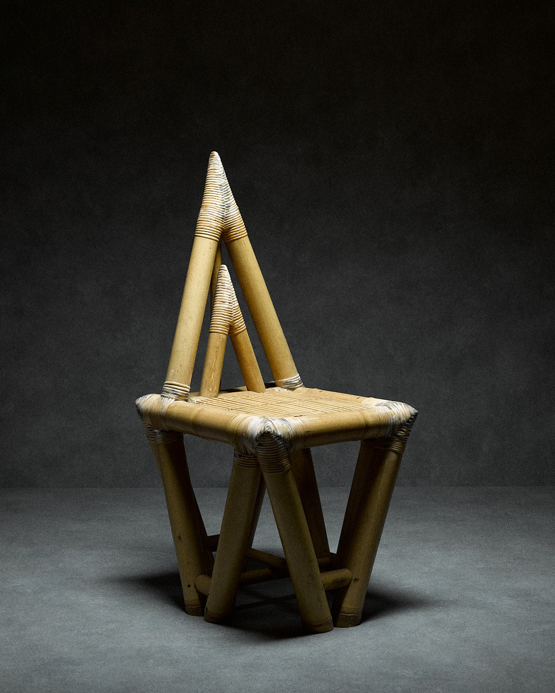 Elephant Chair in Bamboo — angled view highlighting triangular backrest