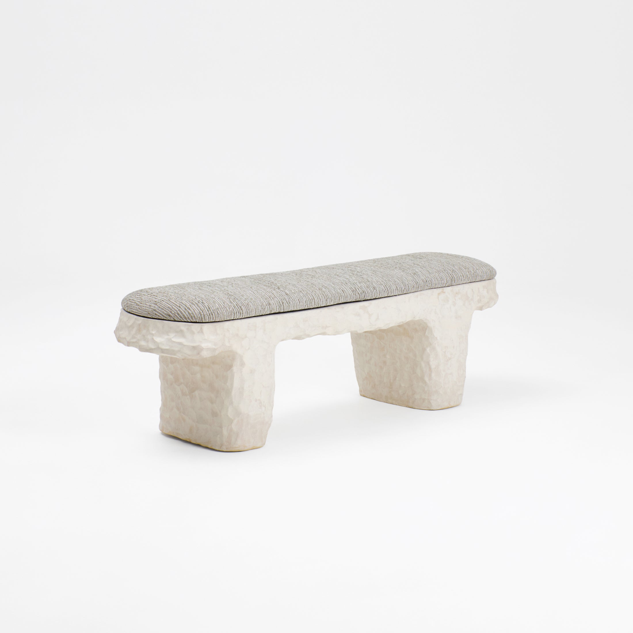 Perícia Ceramic Bench — close-up of textured ceramic base with fabric seat