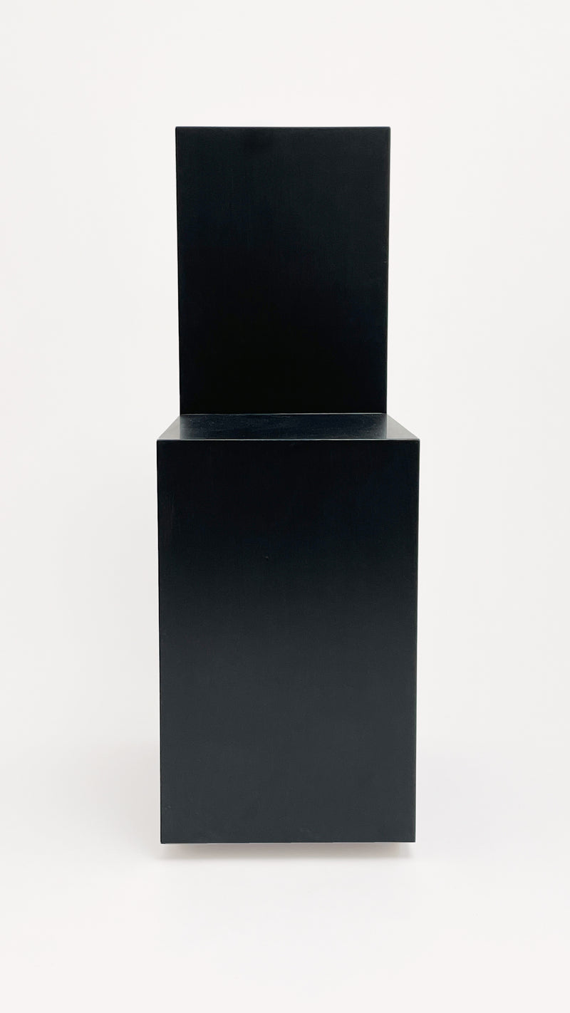 The Art Rocker Chair by GOONS, a black minimalist geometric chair featuring a rectangular seat and backrest, showcases customizable contemporary furniture design against a plain white background.