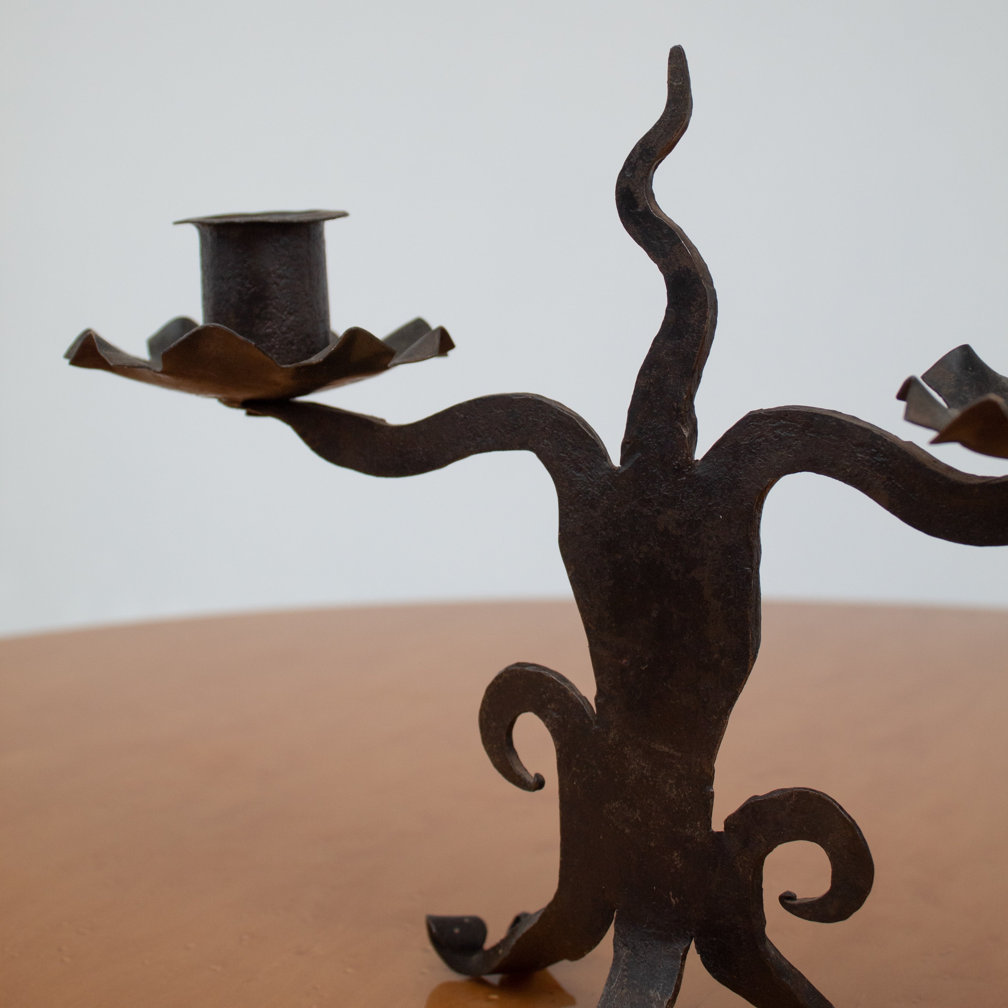 Vintage Candle Holders in Metal - Pair Collection — close-up of textured dark metal design