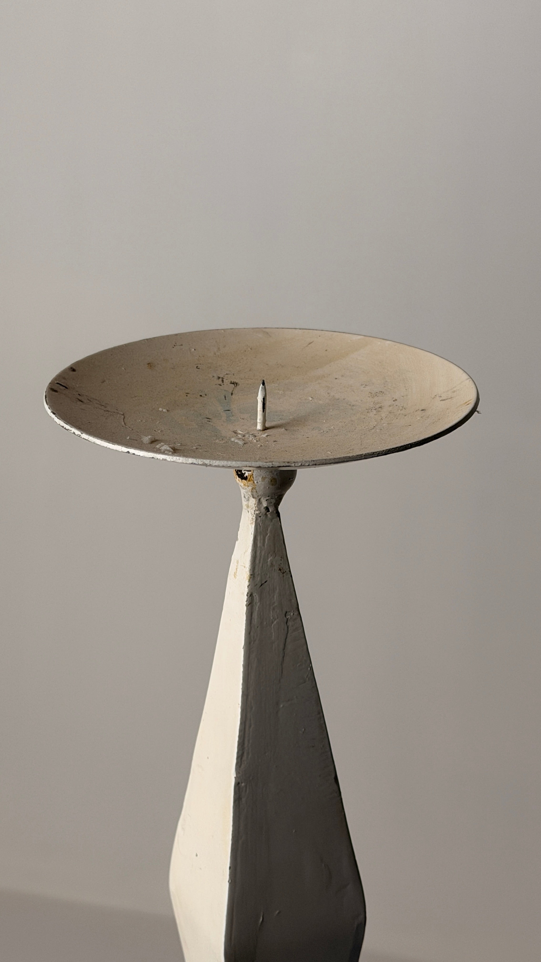 White-patinated Iron Candlestick, France, early 20th century — top view highlighting circular dish and textured surface