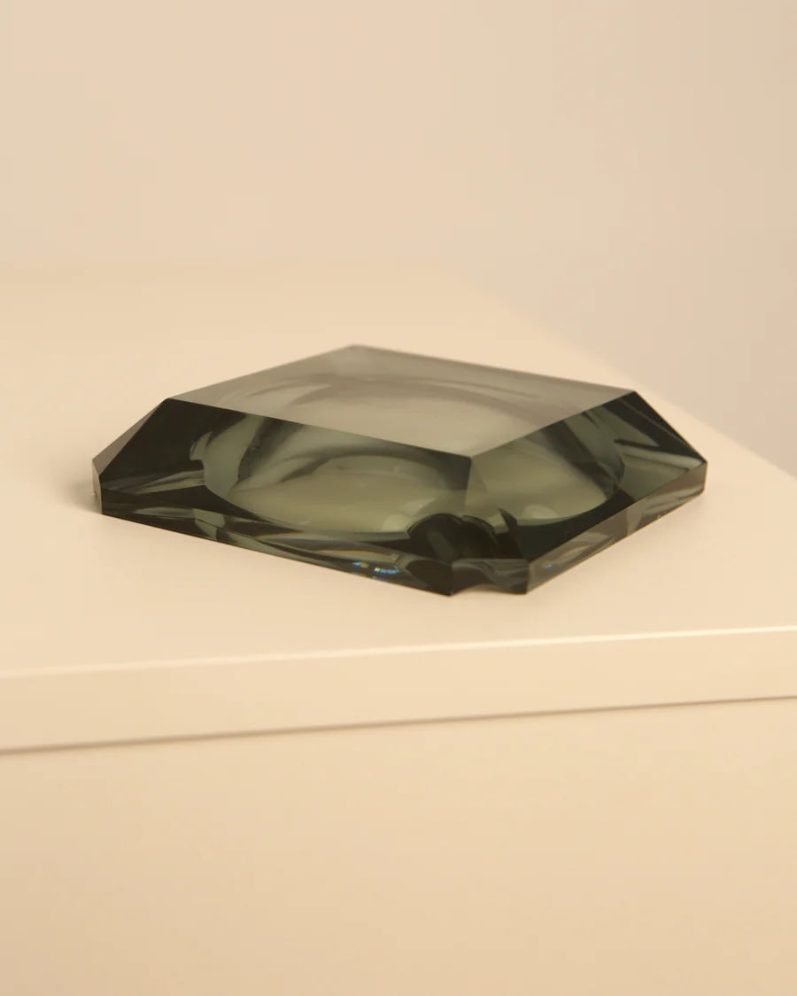 Octagonal teal glass ashtray by Fontana Arte, side profile view