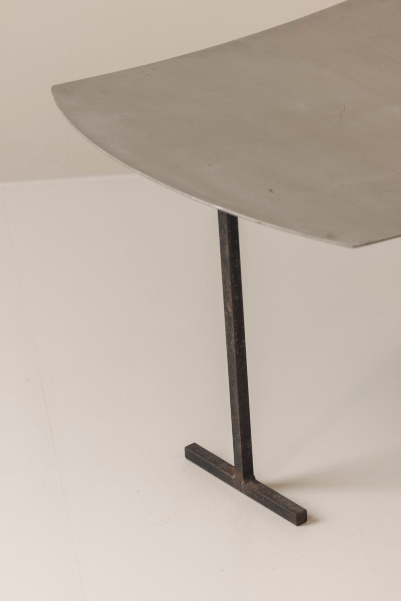 A striking set Modernist curved metal stools from France, dating to the 1980s. — in context