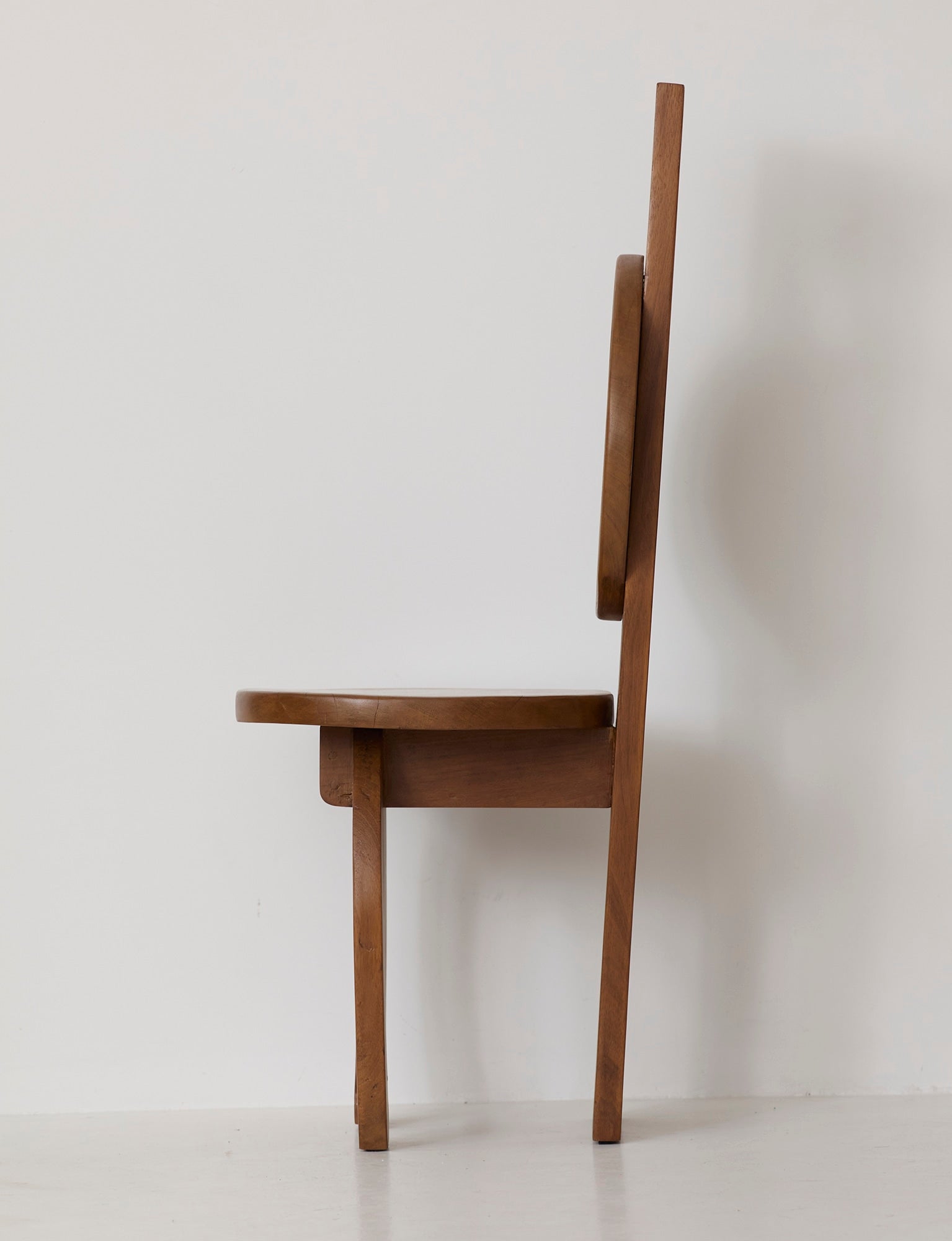 Heavy Sculptural Artisanal Chair in Solid Exotic Wood — lifestyle setting