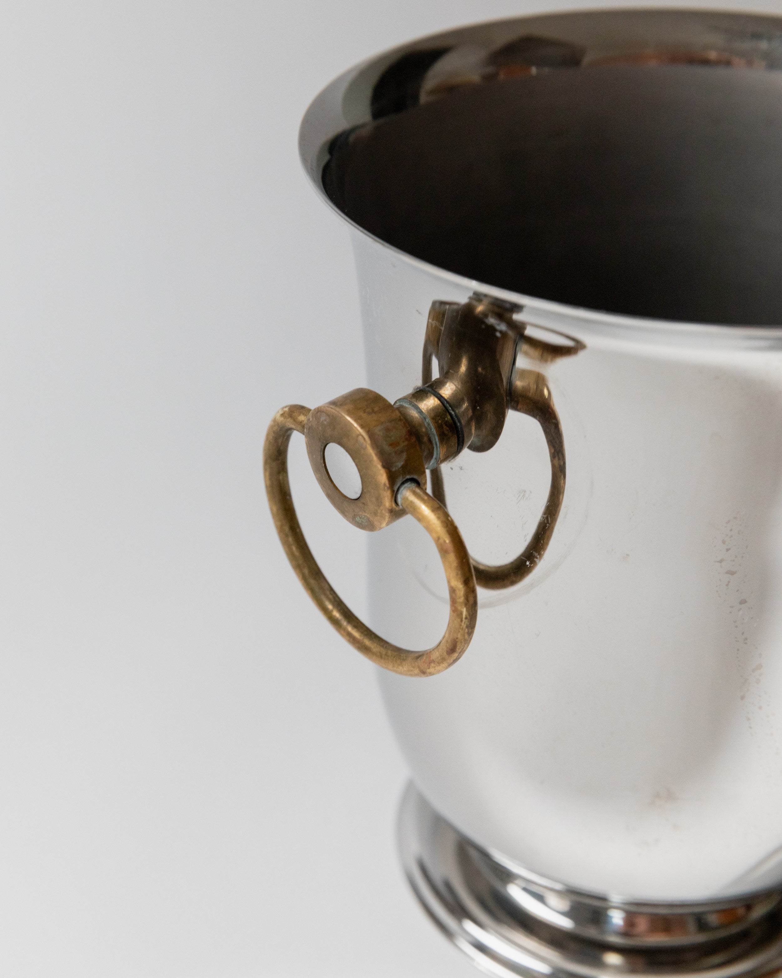 Brass handle detail of vintage champagne wine cooler