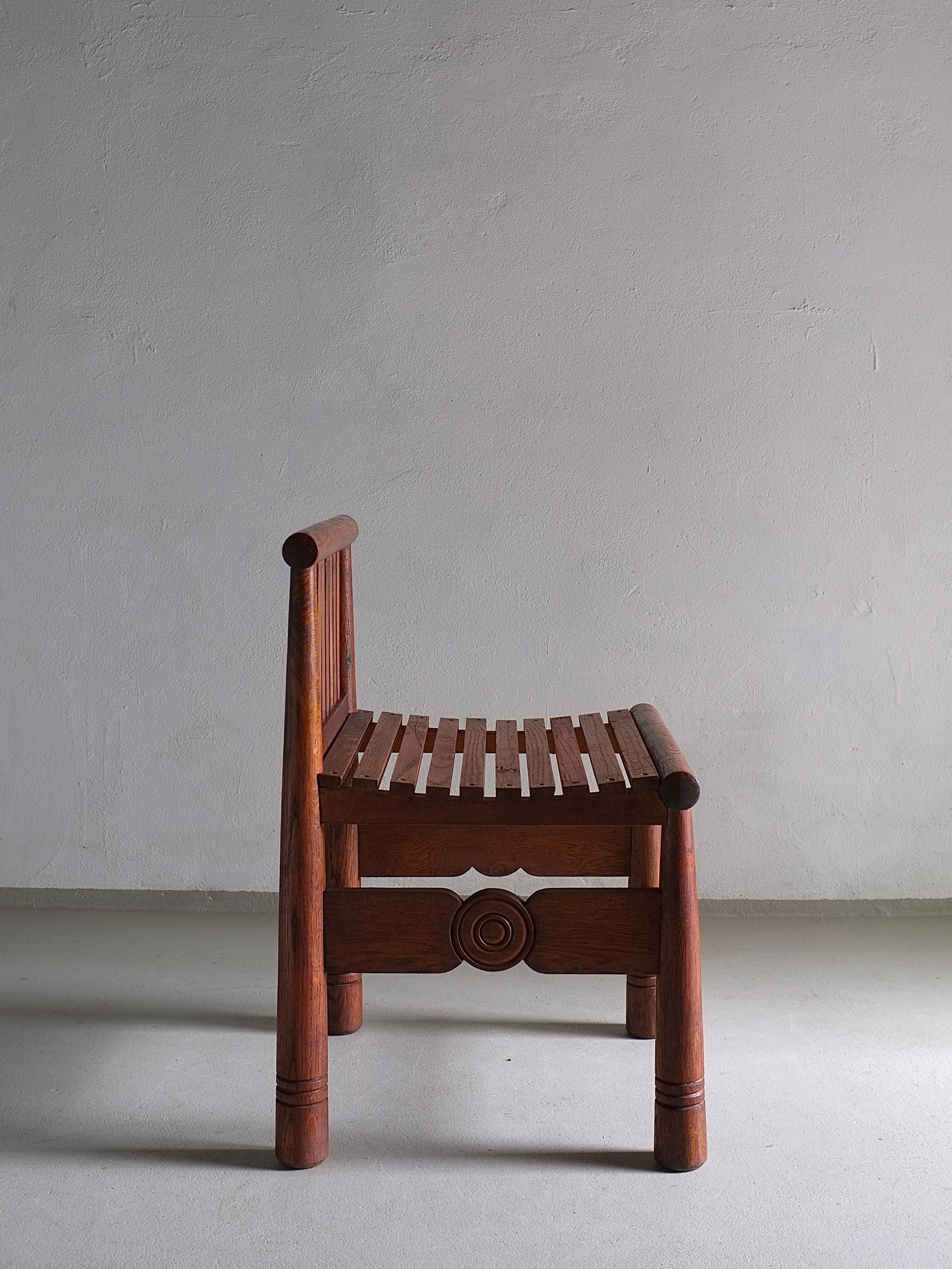 Carved Oak Low Back Chair | France | 1960s — lifestyle setting