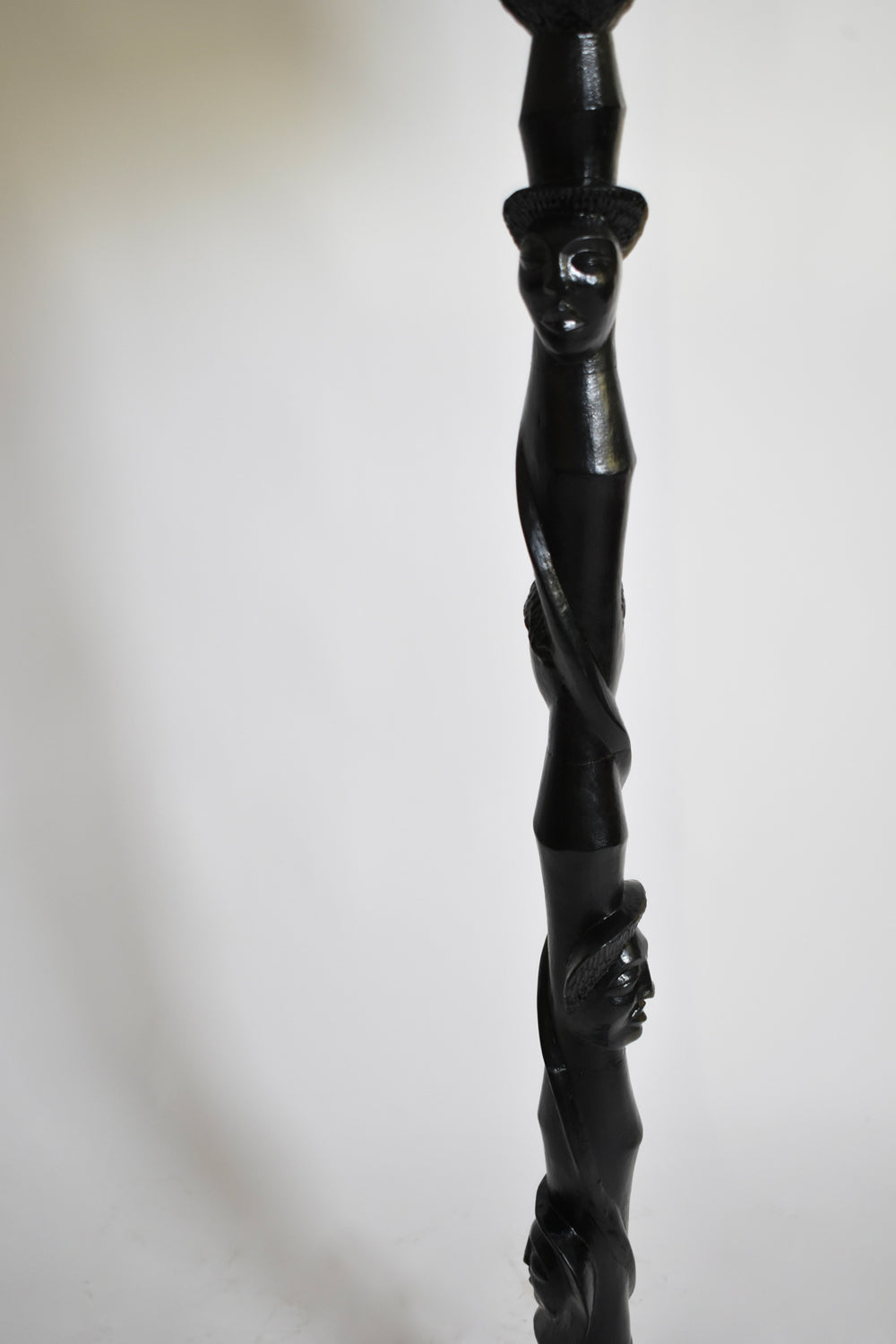 Africanist ebonised wood floor lamp, 1970s — close-up