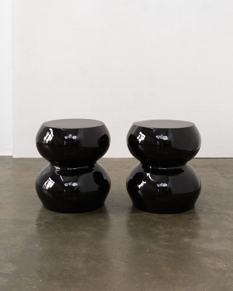Pair of black lacquered sculptural stools from 1970s