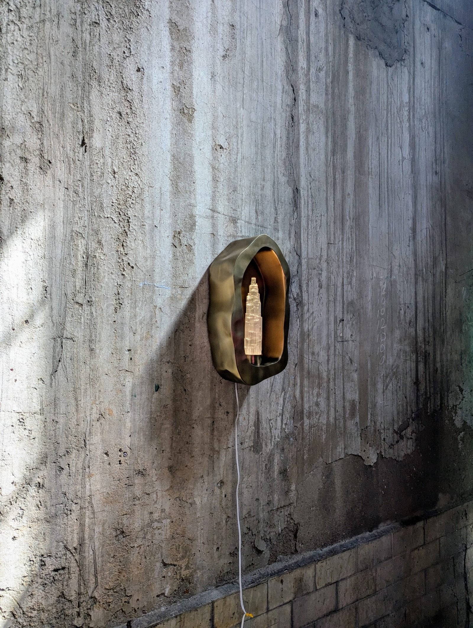 Stainless Steel Wall Sconce - Sigil Series by Nitush Aroosh — lifestyle setting