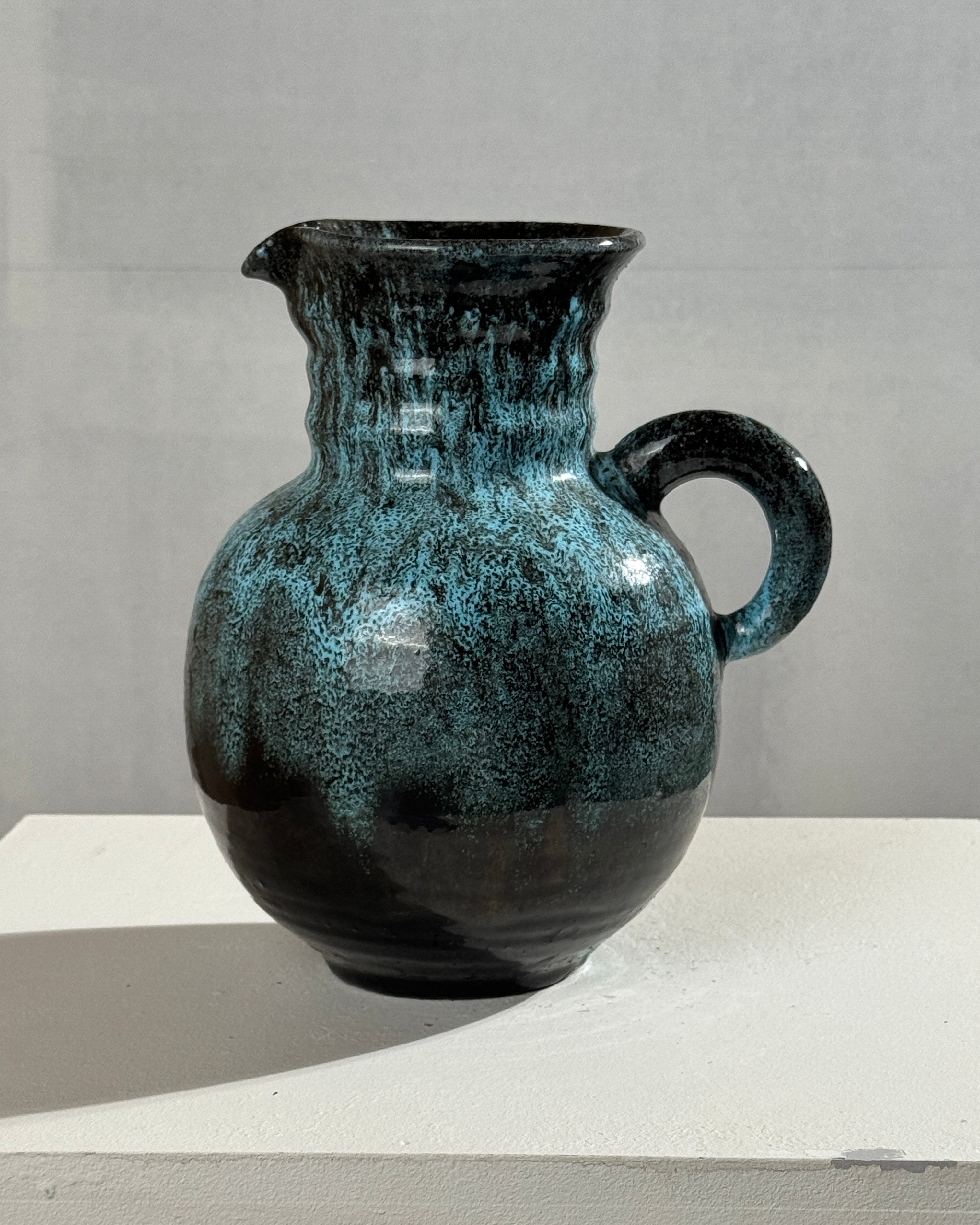Vintage ceramic pitcher with turquoise glaze by Accolay Potters