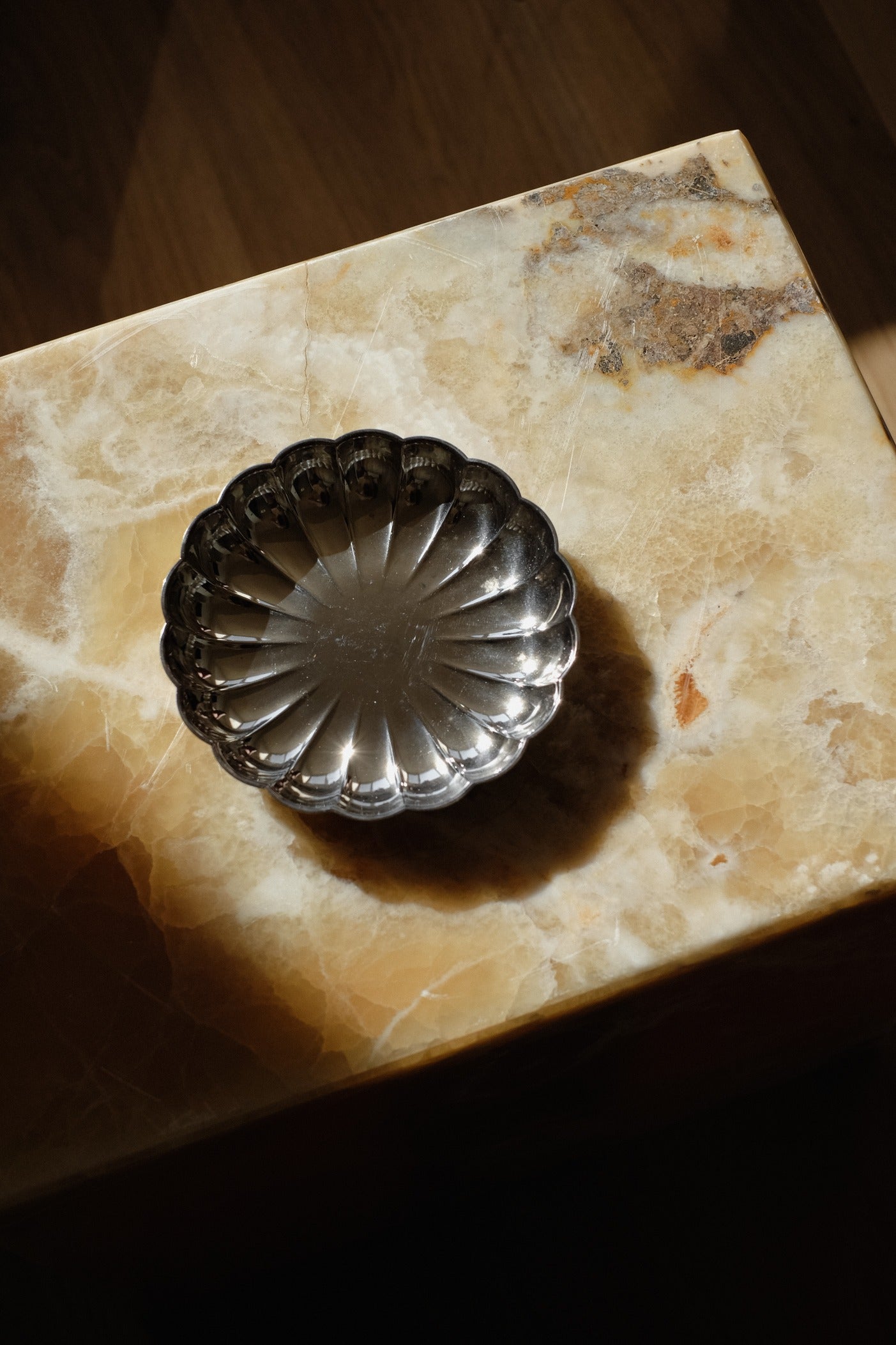 Silver-Plated Dish — top view on marble surface