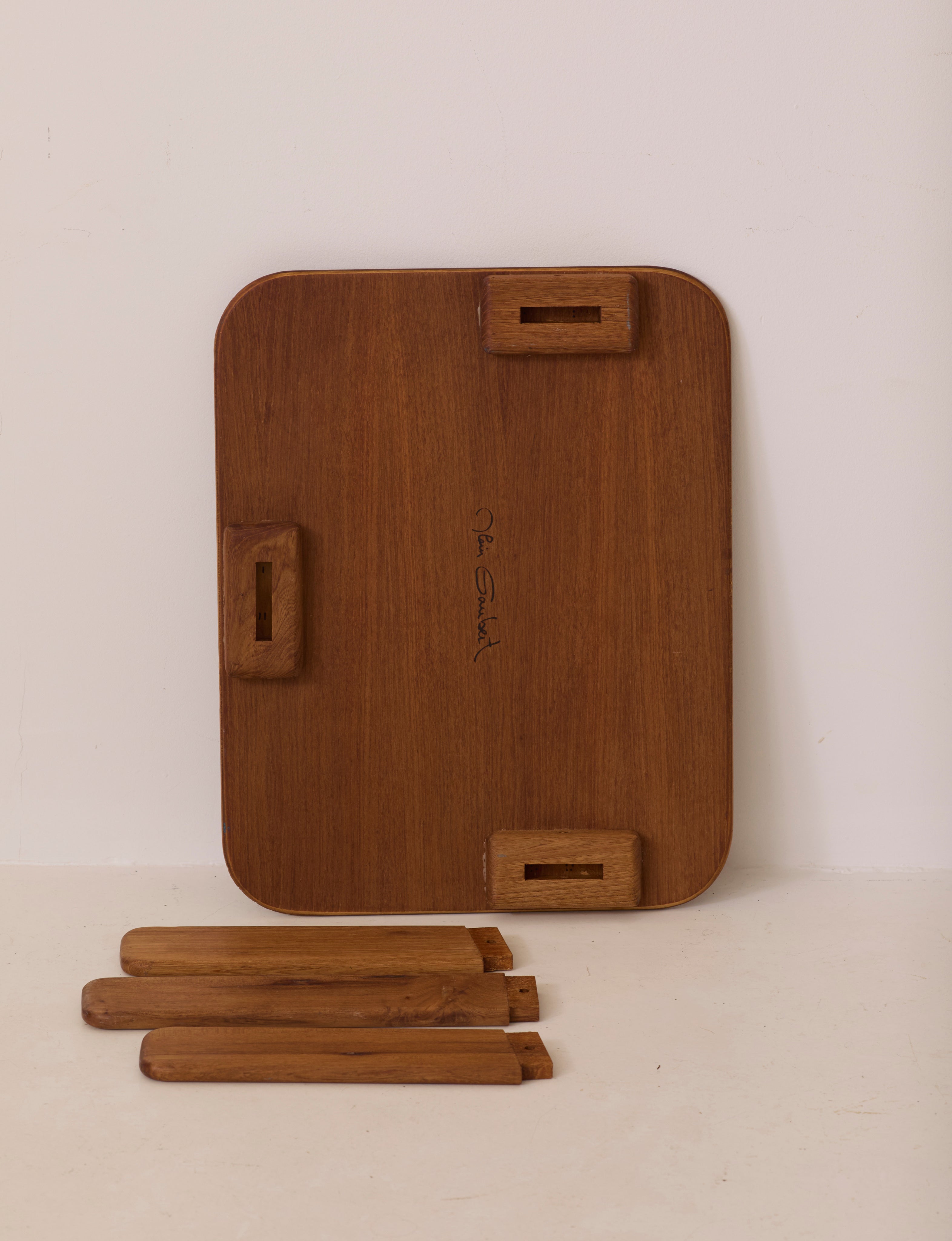 Small dismountable wooden meditation table by Alain Gaubert, France circa 1980 — top view of disassembled table with wooden l