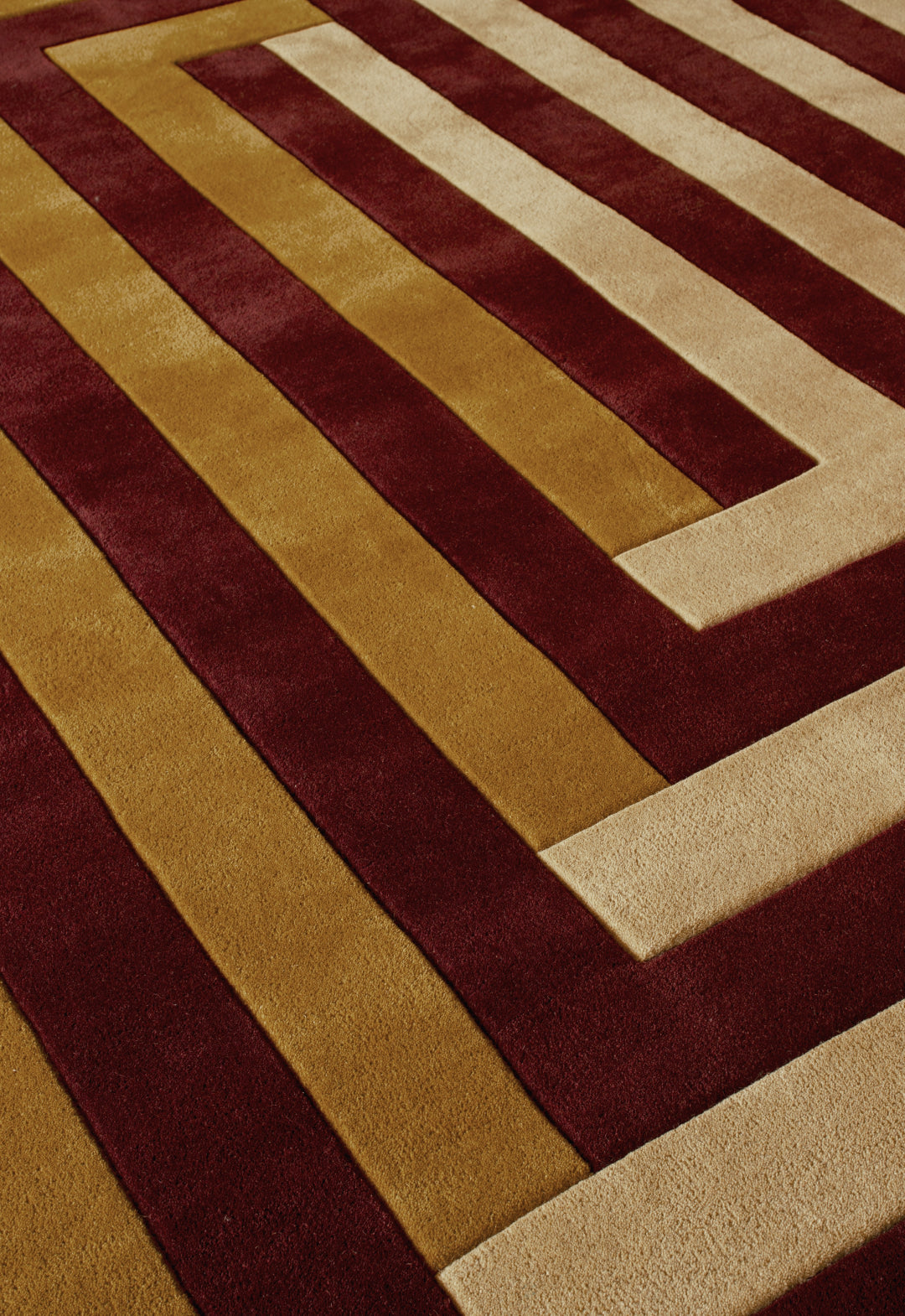 'Labyrinth' Handwoven Wool Rug by Teklan, Mulberry Sand — side angle