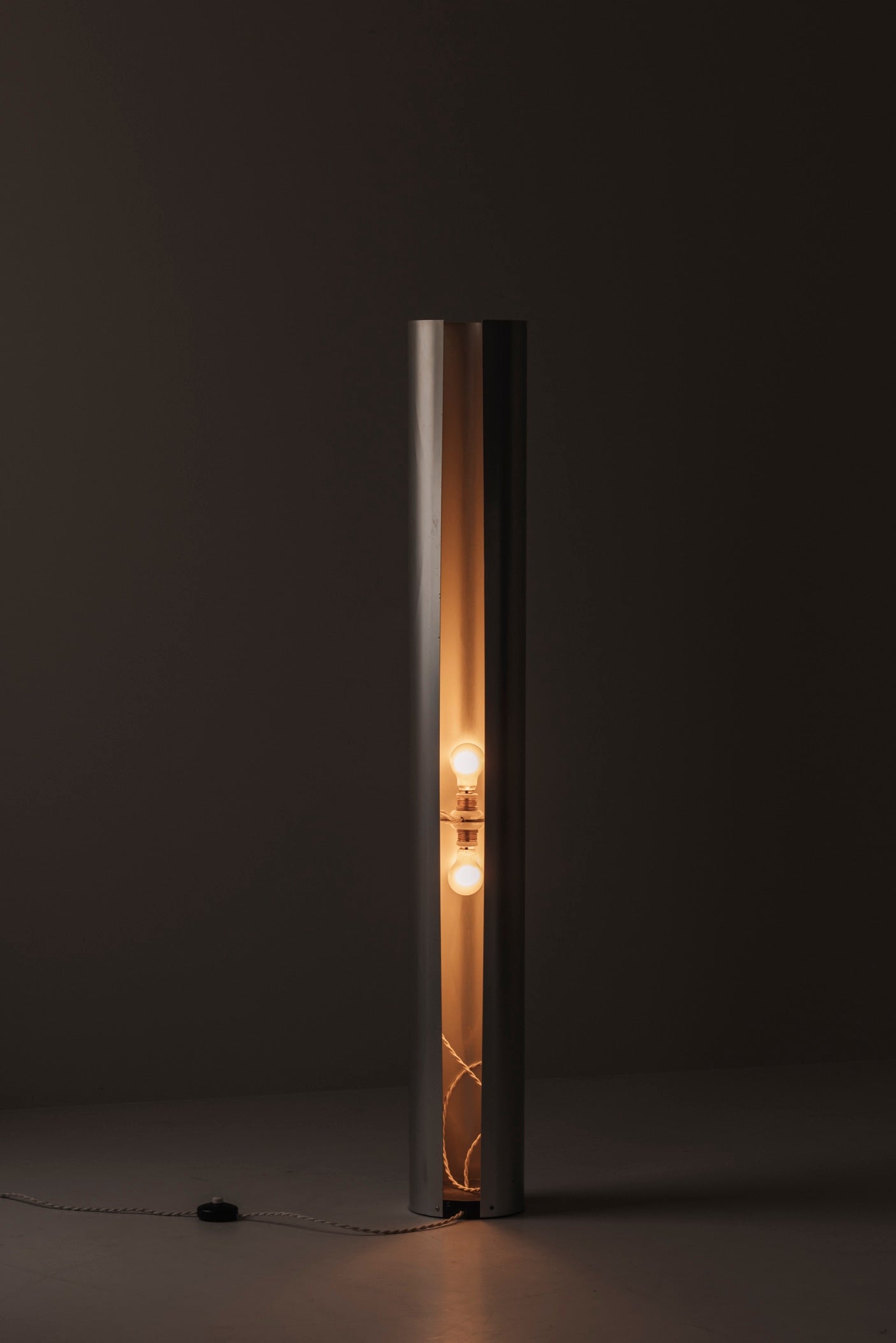 Sculptural metal tube floor lamp, Italy 1960s — in context